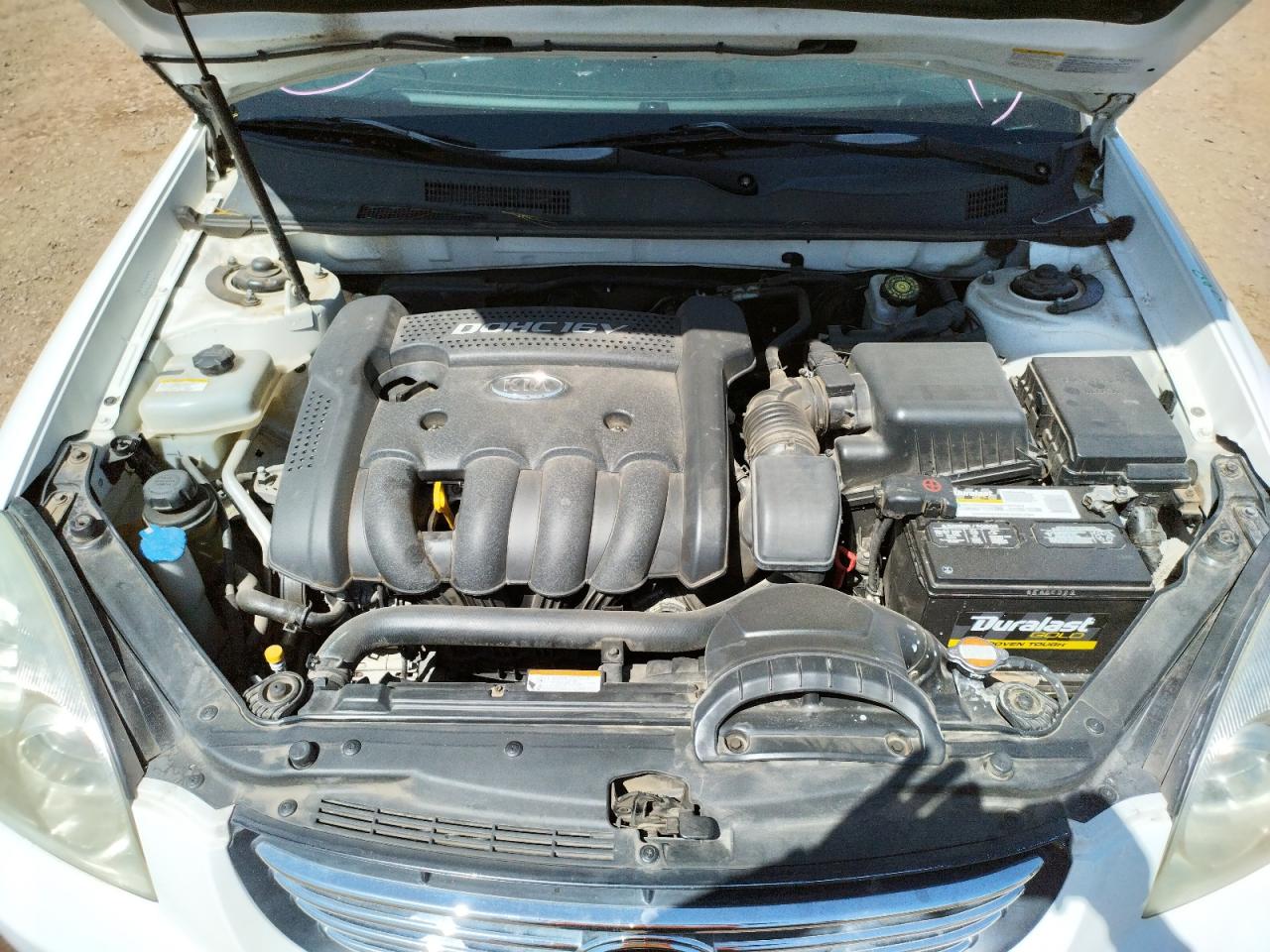 Photo 7 from auction – 2007 KIA OPTIMA LX with VIN KNAGE123775146094