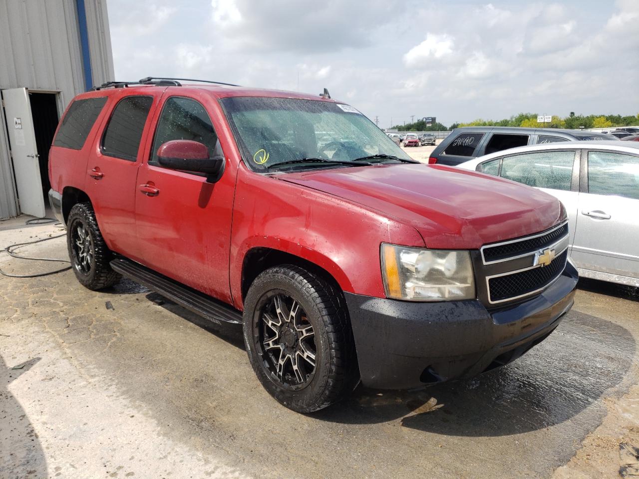 CHEVROLET TAHOE C150 2011 with VIN 1GNSCAE07BR383780 - Photo from auction