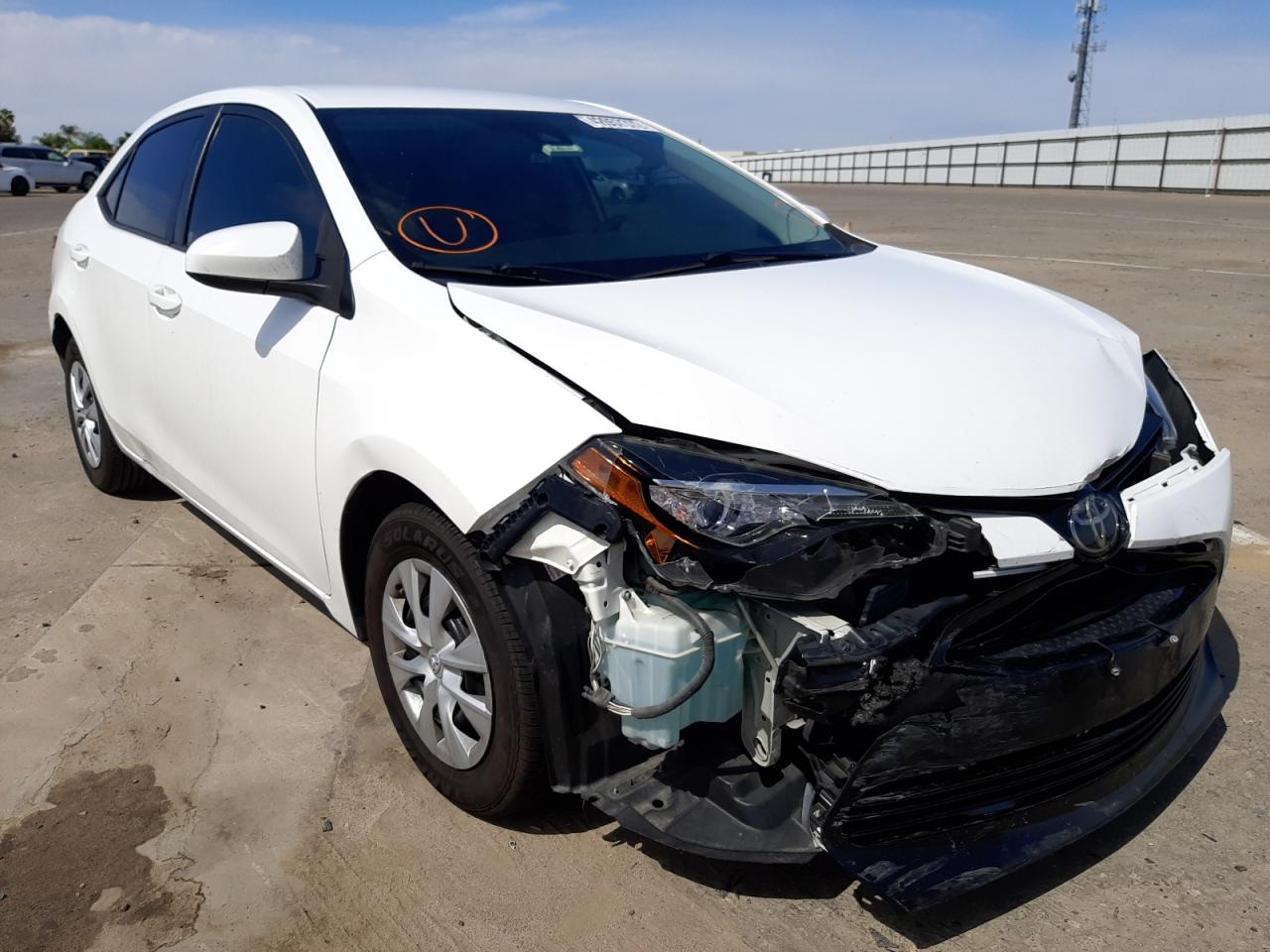 TOYOTA COROLLA L 2017 with VIN 5YFBURHE8HP577815 - Photo from auction