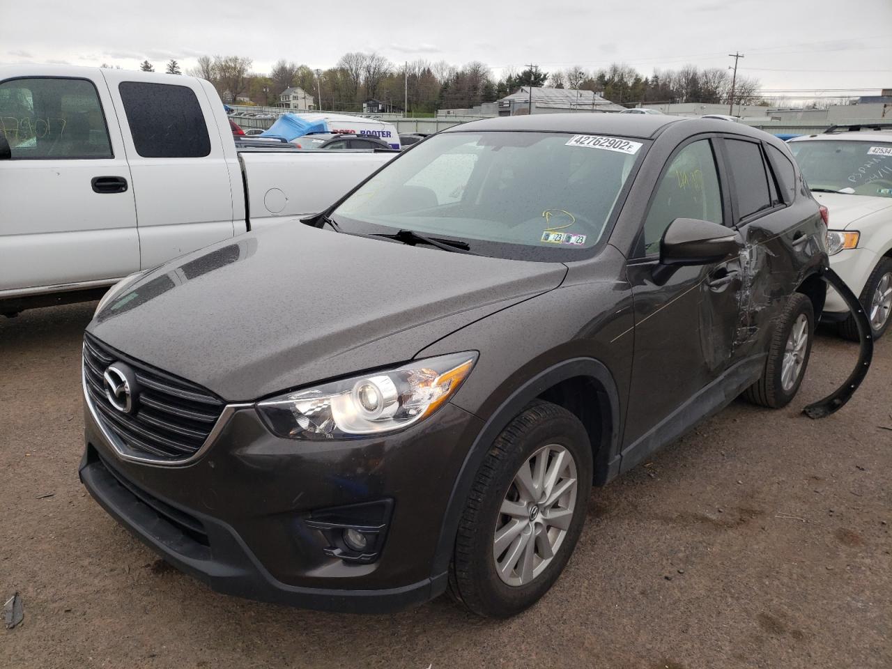 Photo 2 from auction – 2016 MAZDA CX-5 TOURI with VIN JM3KE4CY7G0771902