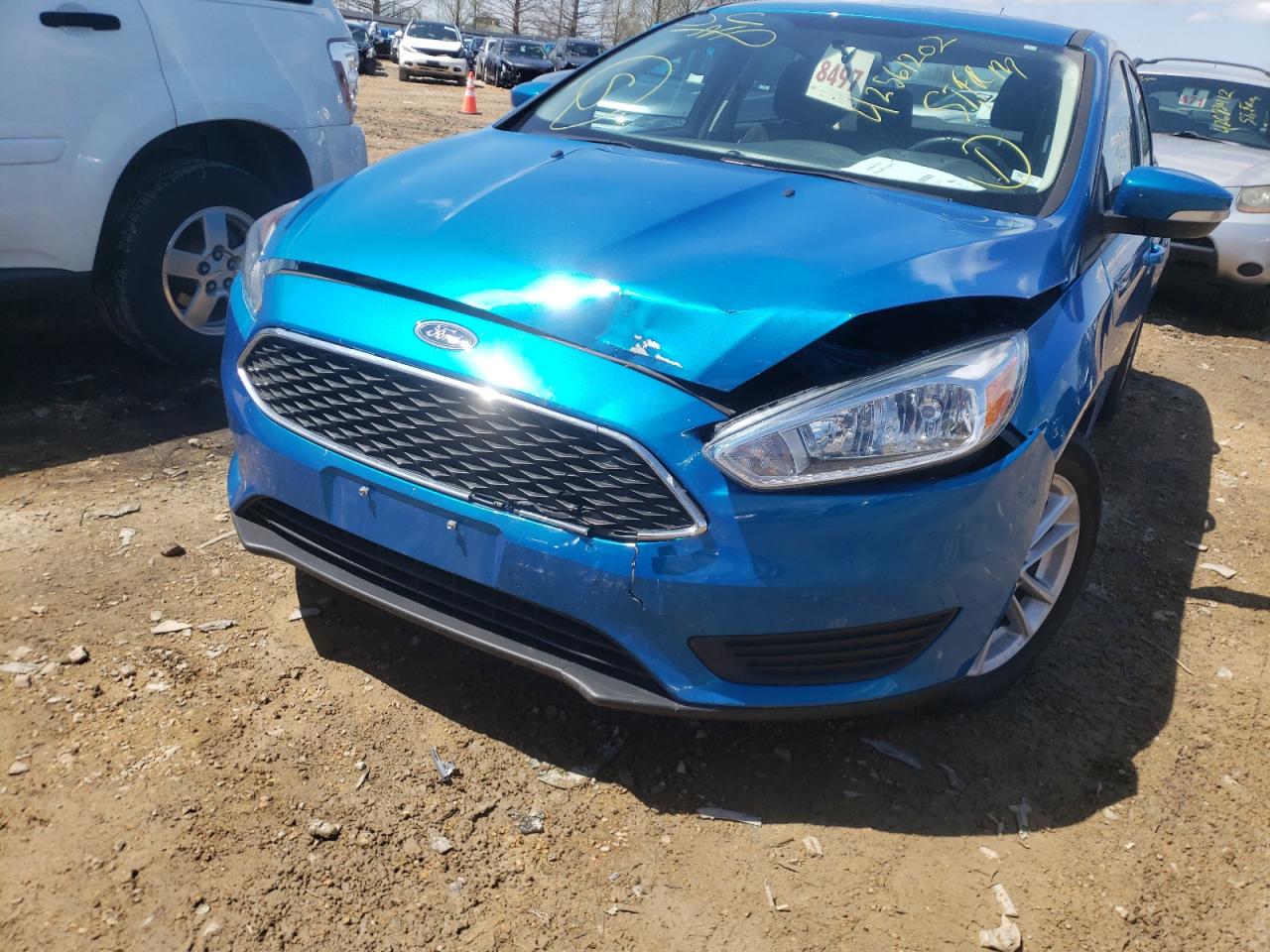 Photo 9 from auction – 2015 FORD FOCUS SE with VIN 1FADP3F29FL340297