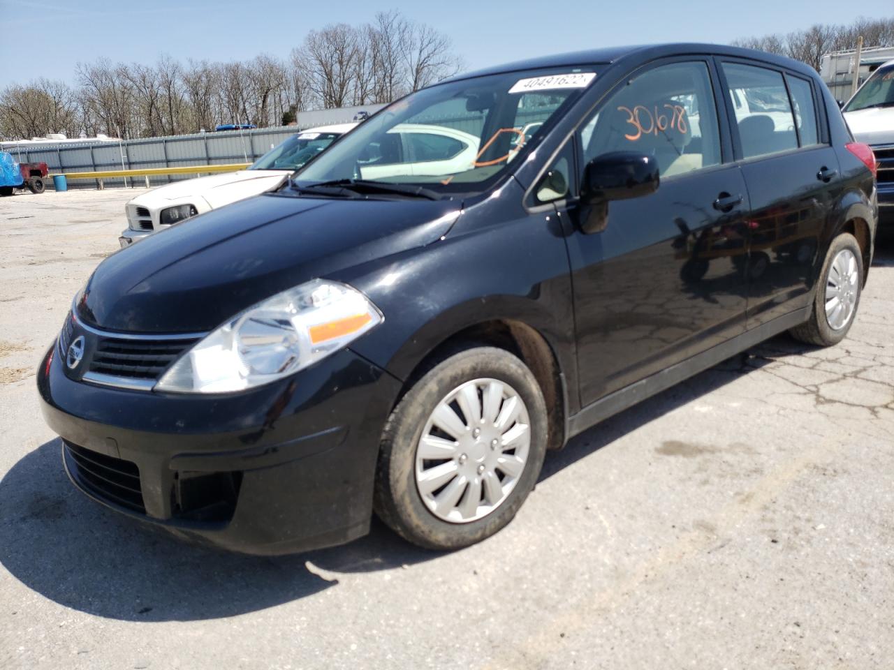 Photo 2 from auction – 2009 NISSAN VERSA S with VIN 3N1BC13E89L362044