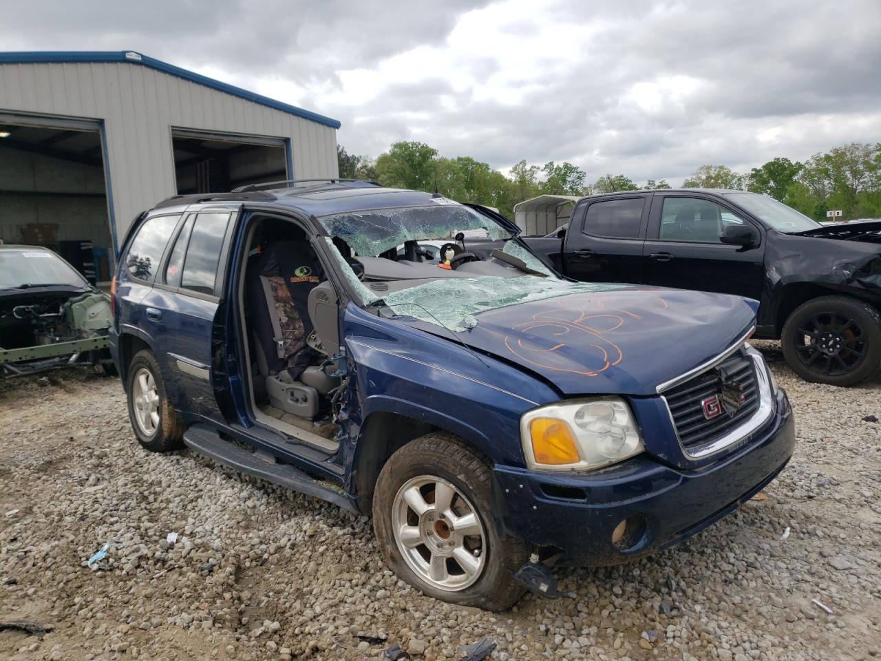 GMC ENVOY 2004 with VIN 1GKDS13S142210541 - Photo from auction