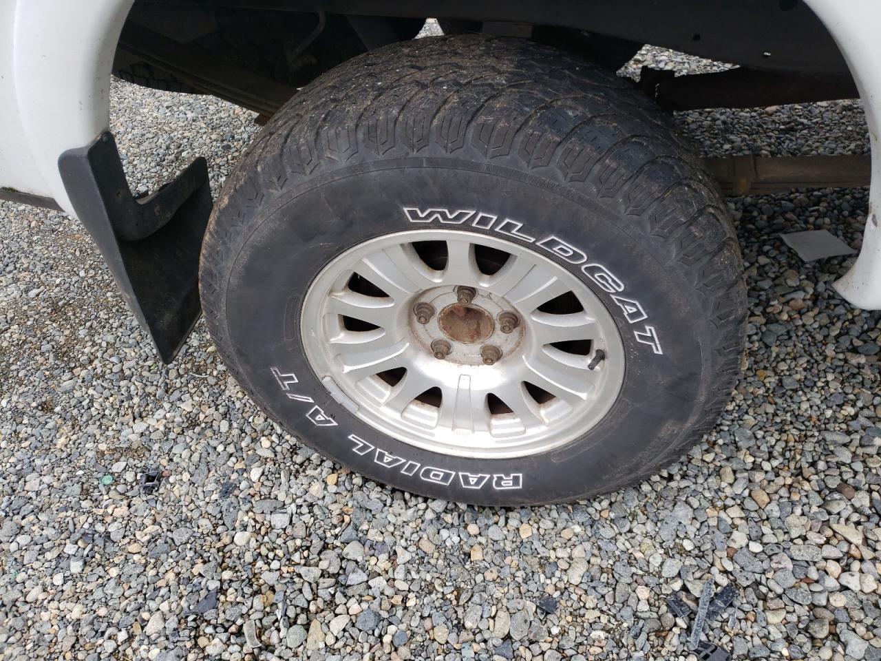 Photo 9 from auction – 1999 FORD F150 with VIN 1FTRX18L6XNC11496