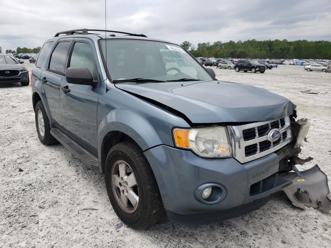 FORD ESCAPE XLT 2011 with VIN 1FMCU0D74BKC21659 - Photo from auction
