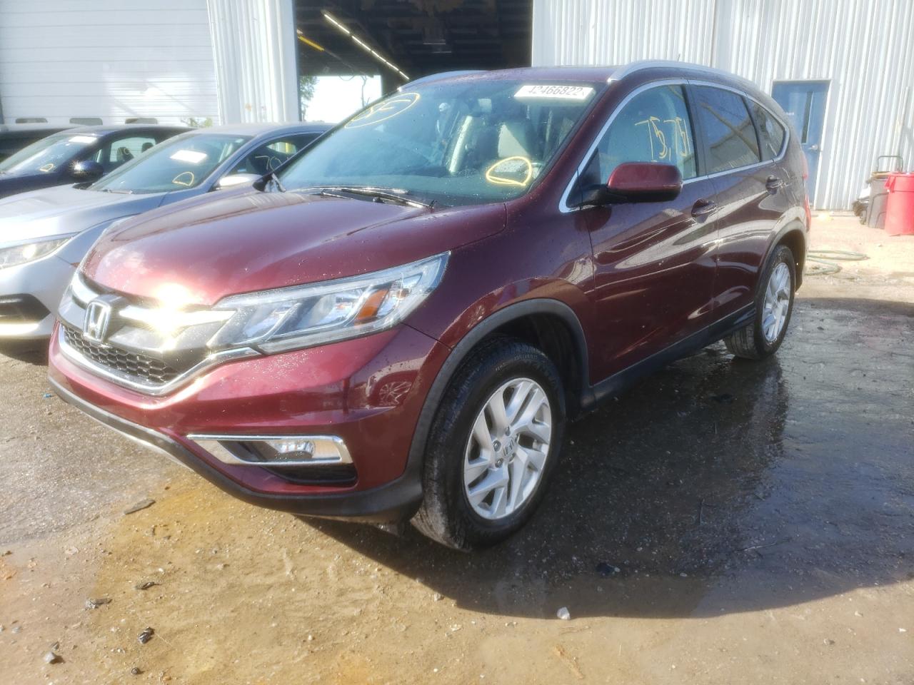 Photo 2 from auction – 2016 HONDA CR-V EXL with VIN 2HKRM3H77GH538092
