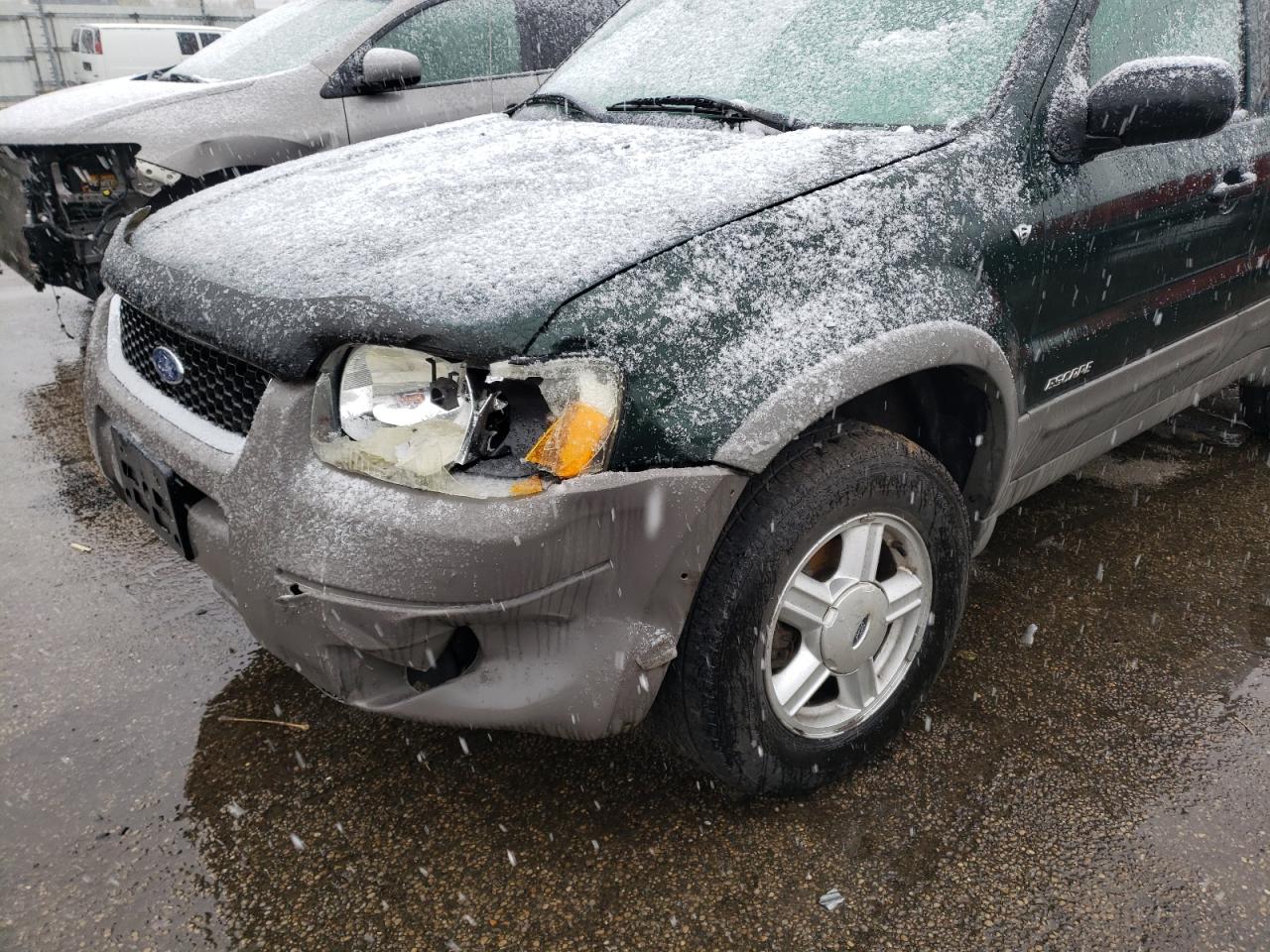 Photo 9 from auction – 2002 FORD ESCAPE XLT with VIN 1FMYU04182KB06225