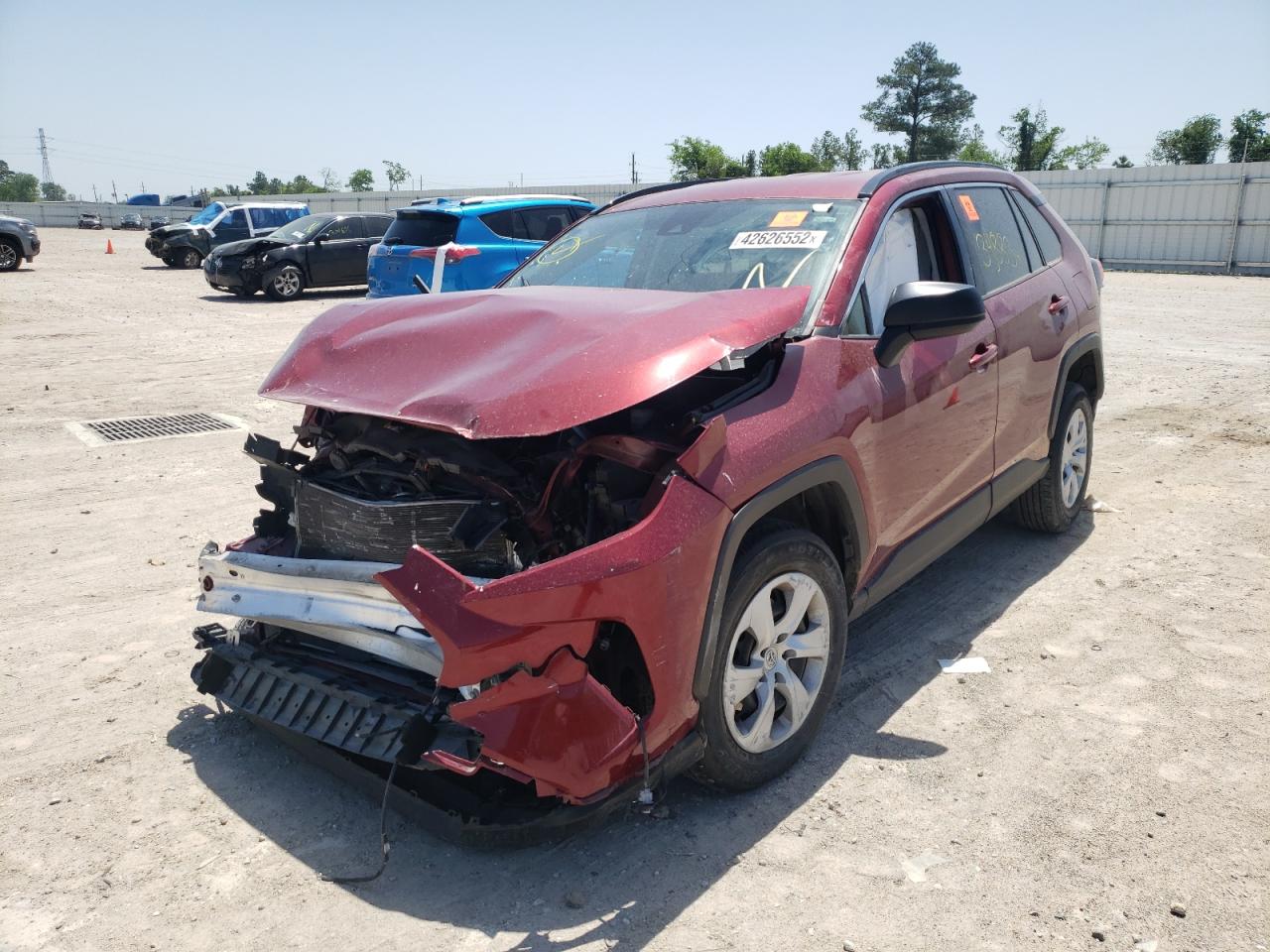 Photo 2 from auction – 2020 TOYOTA RAV4 LE with VIN JTMH1RFV9LD049119