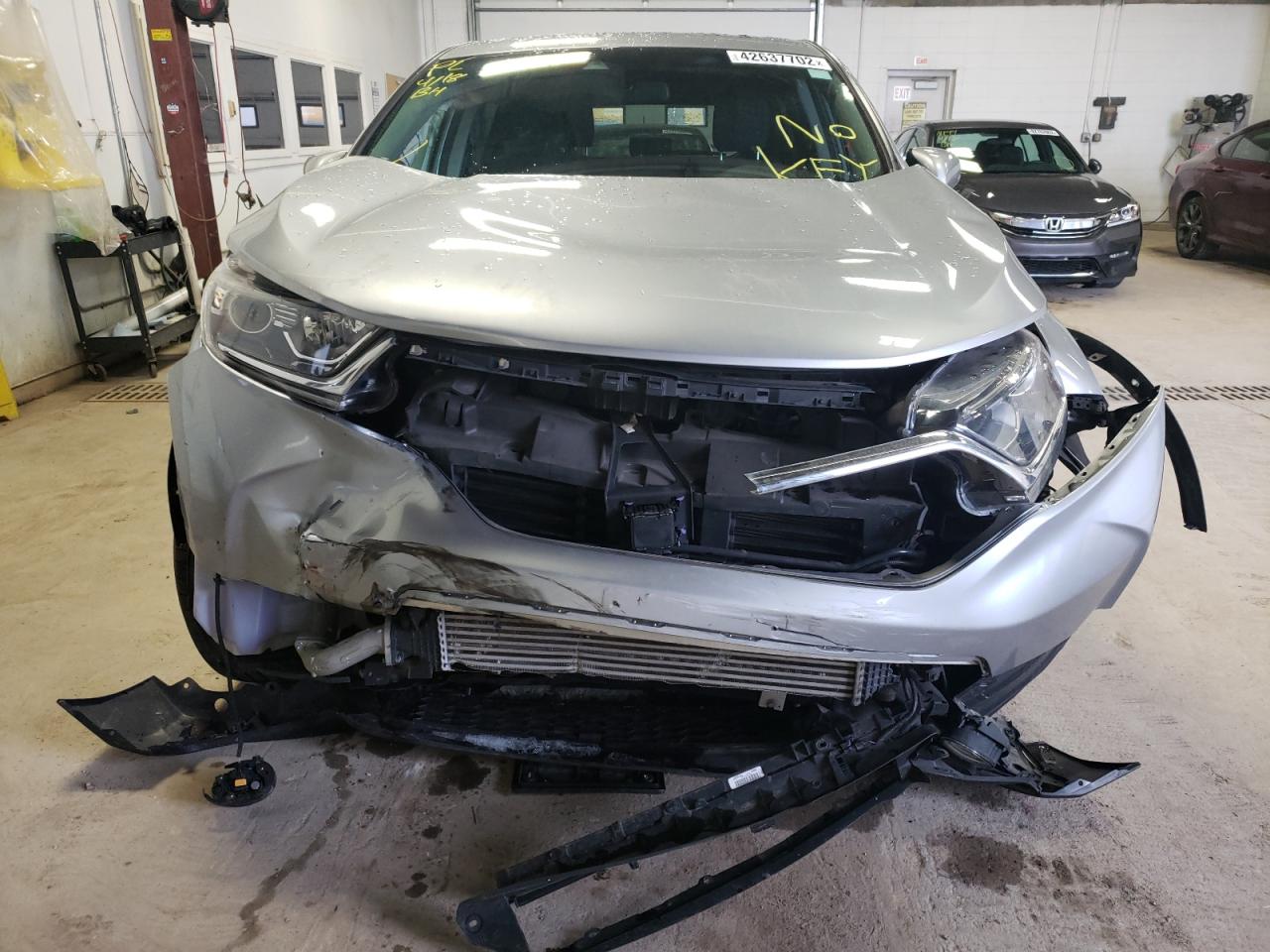 Photo 9 from auction – 2018 HONDA CR-V EX with VIN 7FARW2H56JE027339