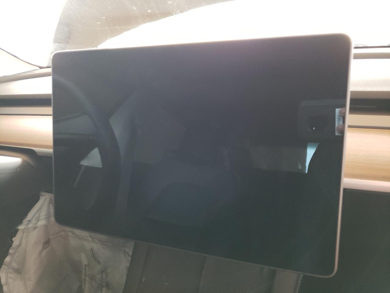 Photo 9 from auction – 2021 TESLA MODEL 3 with VIN 5YJ3E1EC3MF976031