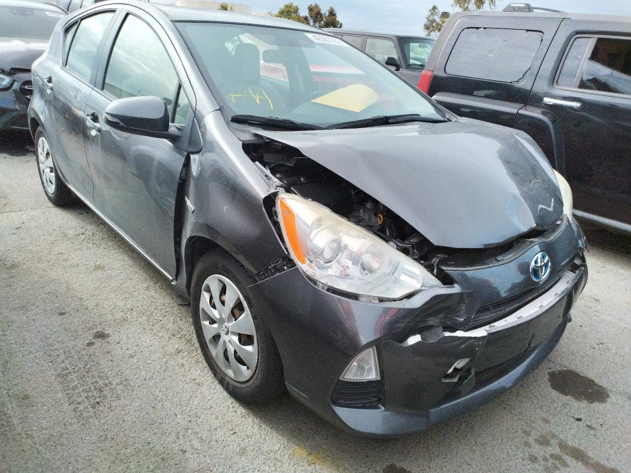 TOYOTA PRIUS C 2012 with VIN JTDKDTB33C1010820 - Photo from auction