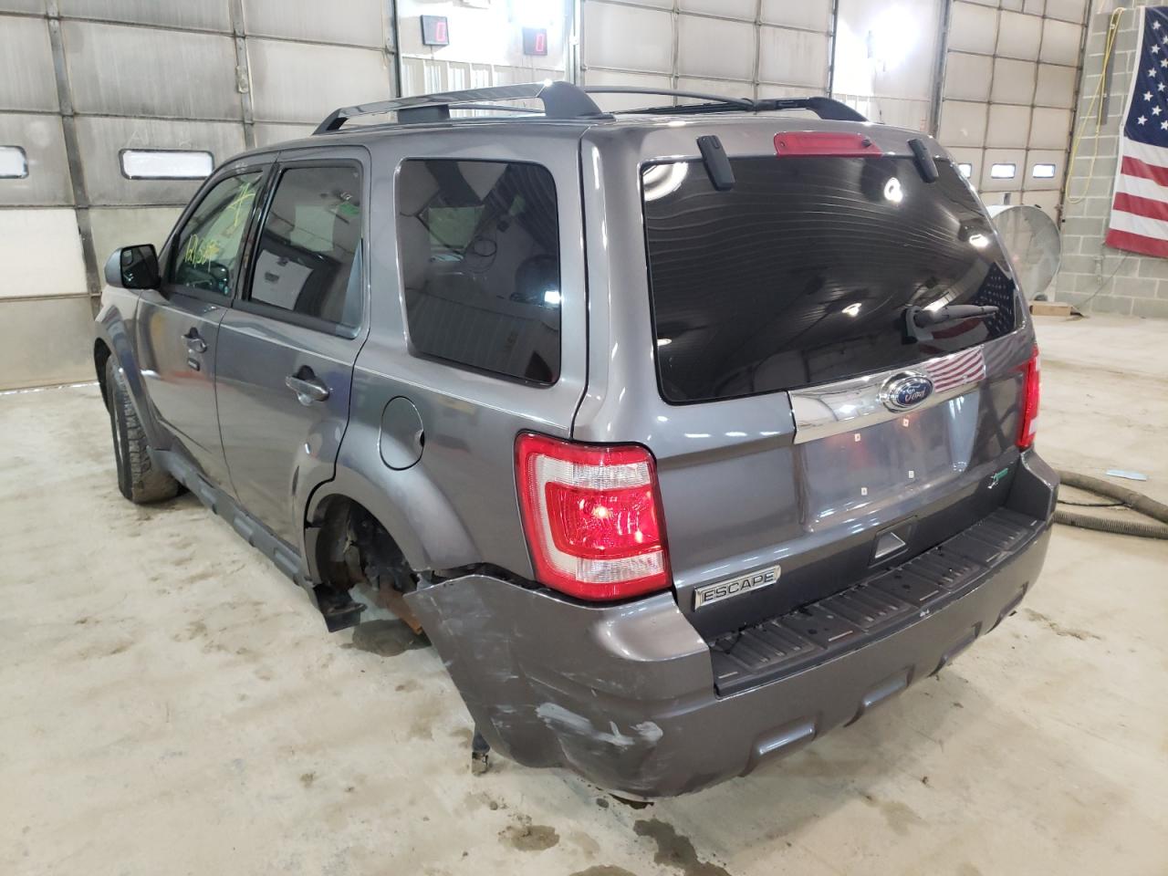 Photo 3 from auction – 2010 FORD ESCAPE LIM with VIN 1FMCU0EG0AKA78500