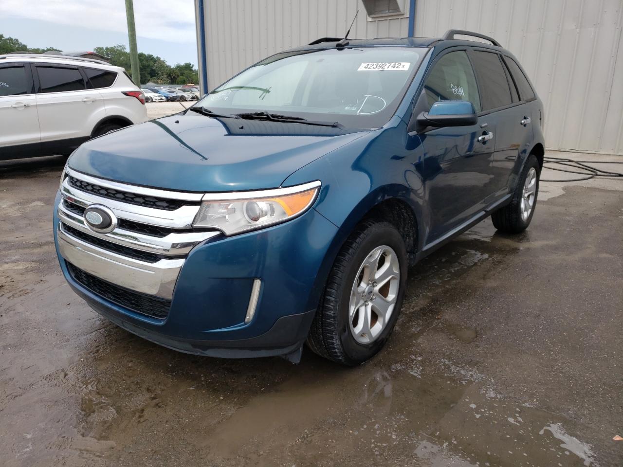 Photo 2 from auction – 2011 FORD EDGE SEL with VIN 2FMDK3JC1BBB26029
