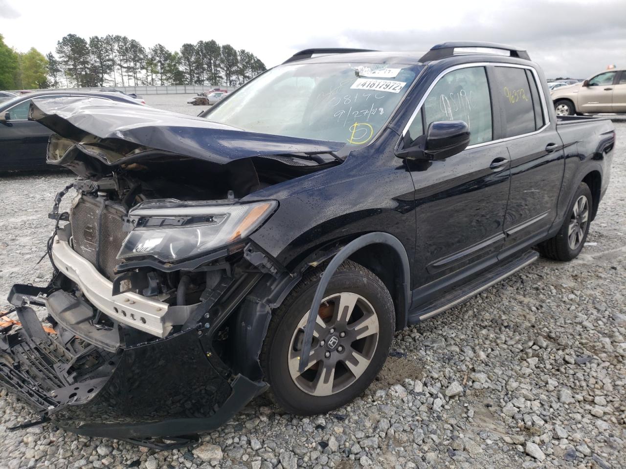 Photo 2 from auction – 2017 HONDA RIDGELINE with VIN 5FPYK2F62HB008190