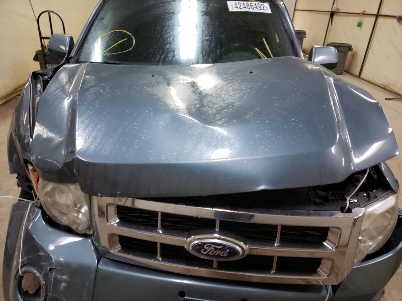 Photo 7 from auction – 2010 FORD ESCAPE LIM with VIN 1FMCU9EG3AKA94761
