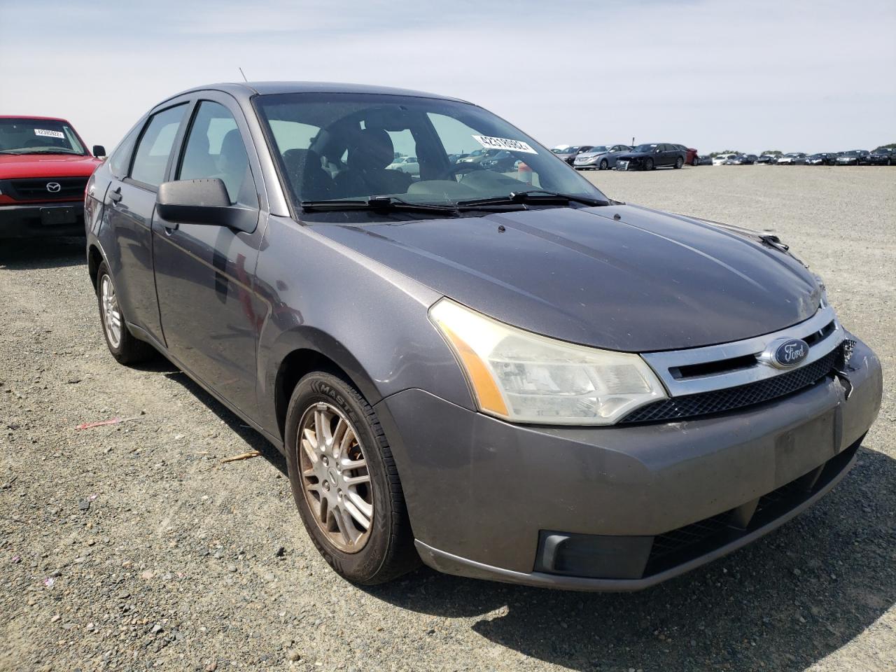FORD FOCUS SE 2010 with VIN 1FAHP3FN9AW203203 - Photo from auction