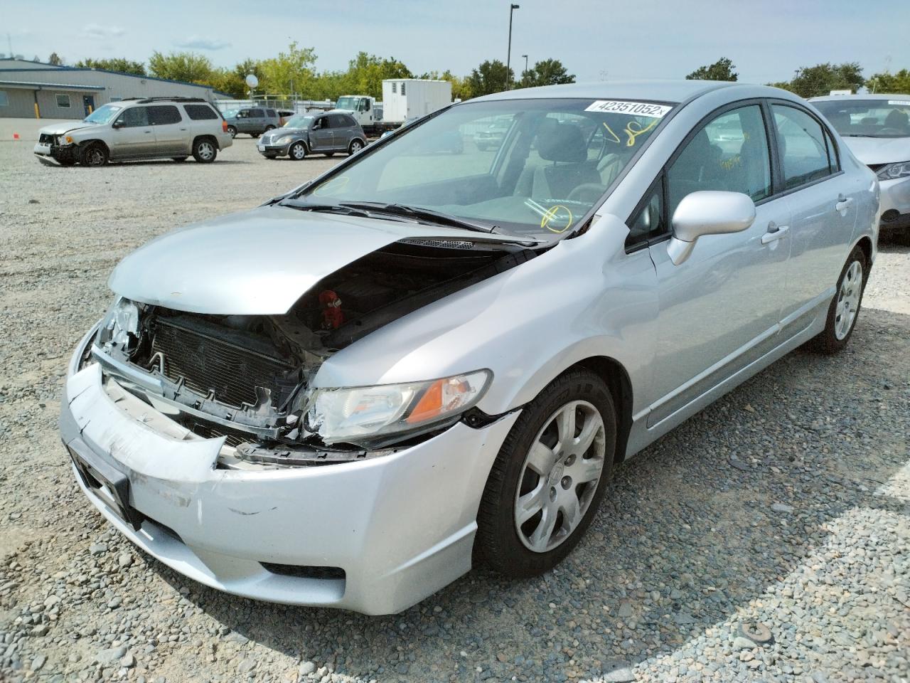 Photo 2 from auction – 2011 HONDA CIVIC LX with VIN 2HGFA1F57BH531695