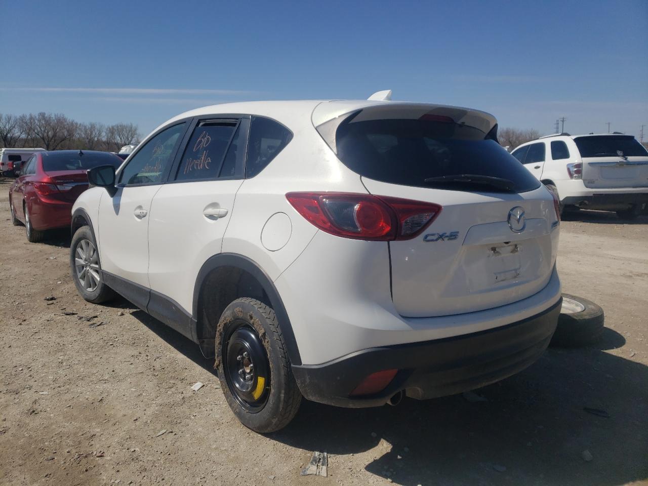 Photo 3 from auction – 2015 MAZDA CX-5 TOURI with VIN JM3KE2CY0F0521341