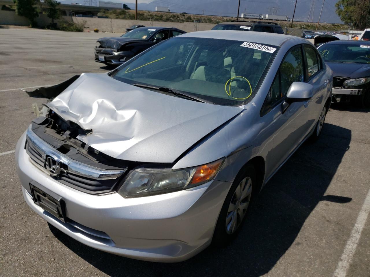 Photo 2 from auction – 2012 HONDA CIVIC LX with VIN 2HGFB2F53CH312219