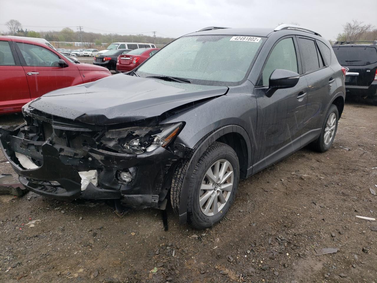Photo 2 from auction – 2016 MAZDA CX-5 TOURI with VIN JM3KE4CY6G0760101