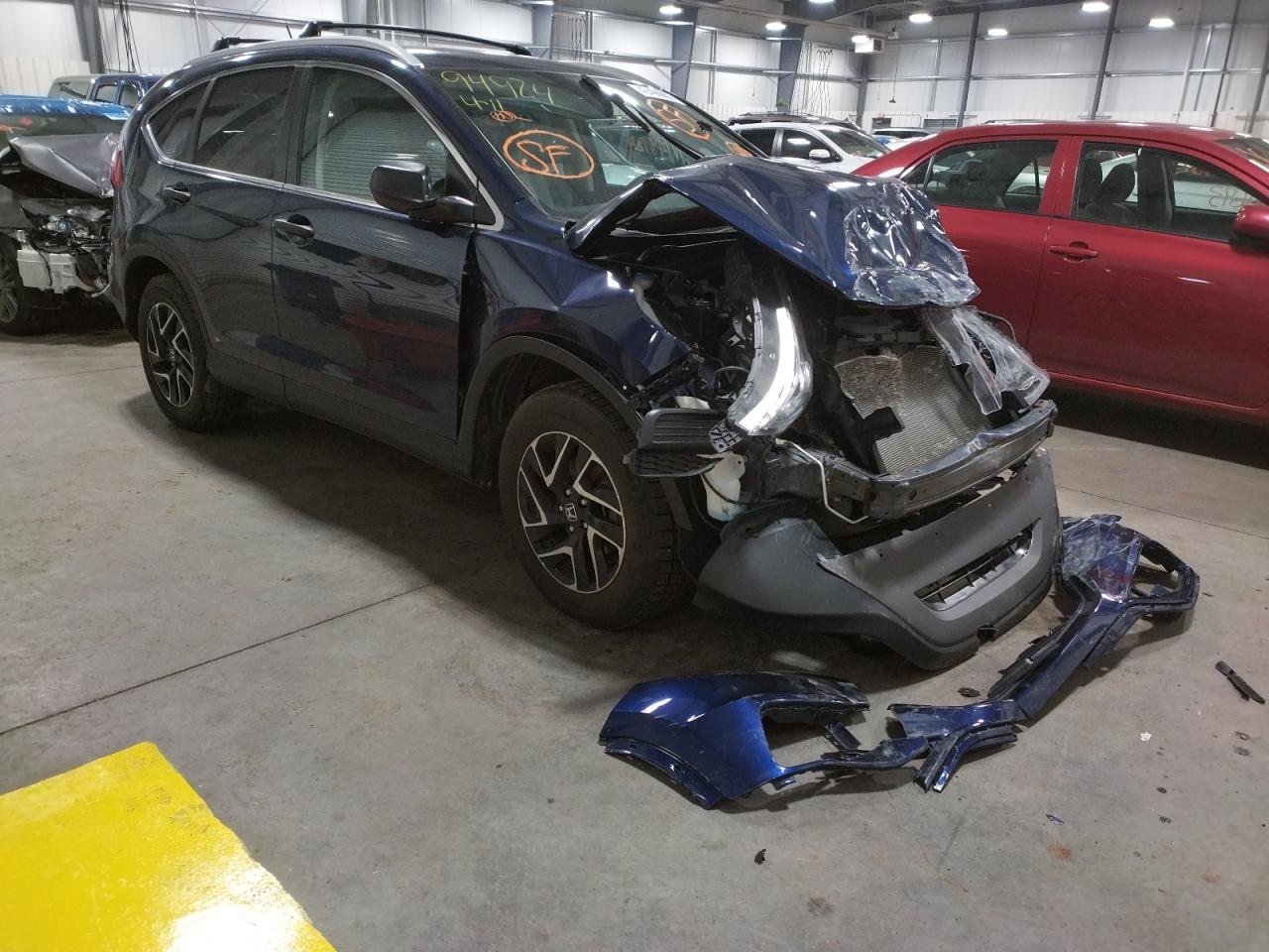 HONDA CR-V SE 2016 with VIN 5J6RM4H4XGL045749 - Photo from auction