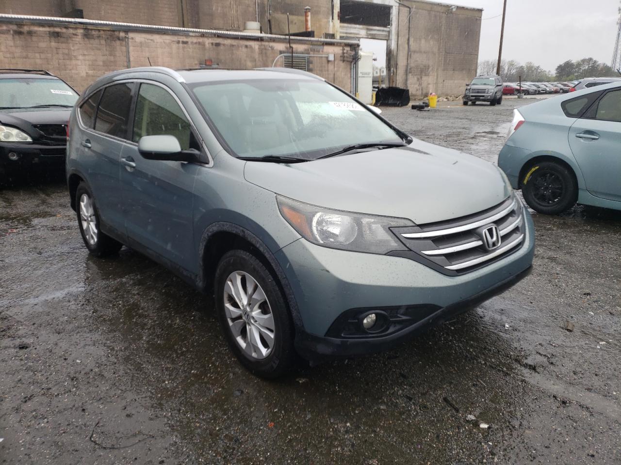 HONDA CRV 2012 with VIN JHLRM4H72CC015898 - Photo from auction