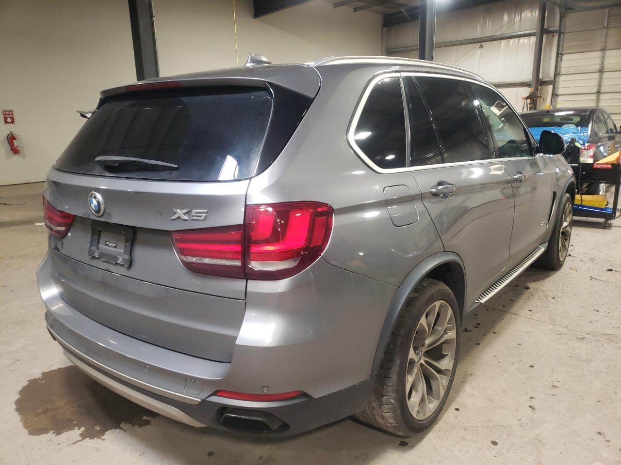 Photo 4 from auction – 2015 BMW X5 XDRIVE5 with VIN 5UXKR6C52F0J79464