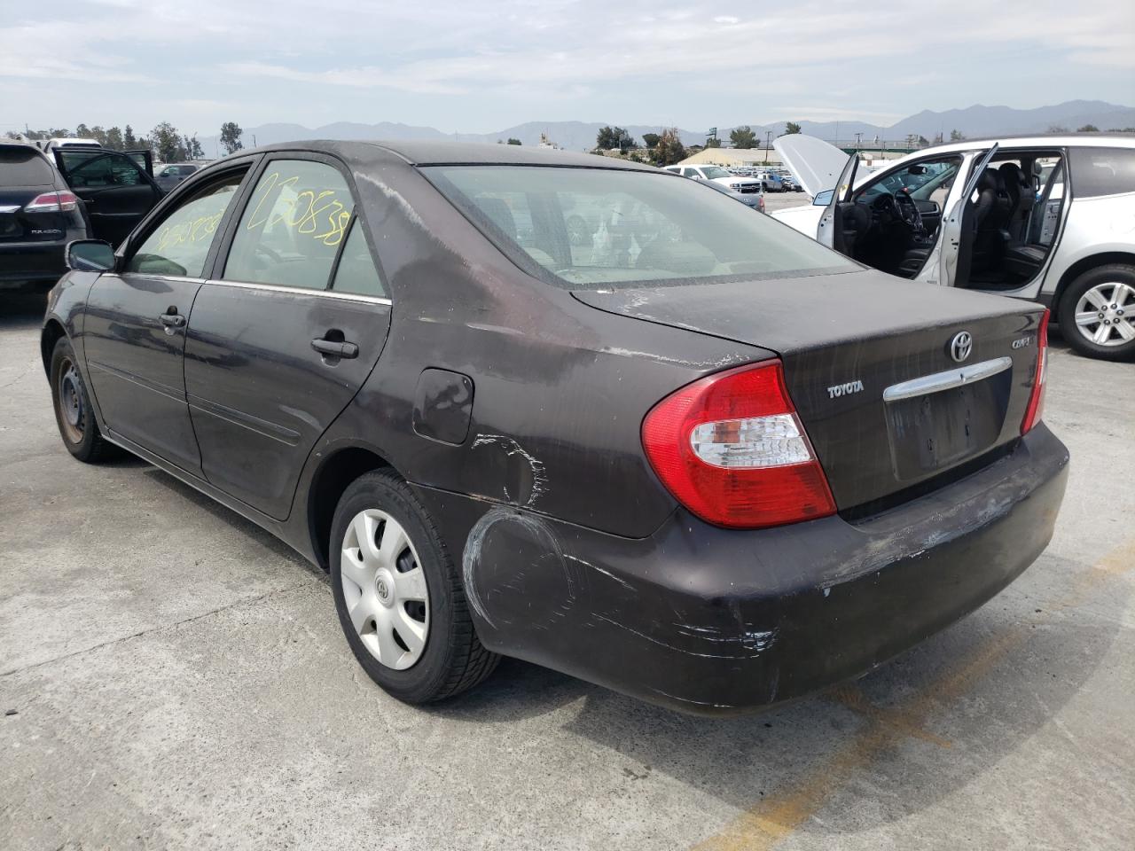 Photo 3 from auction – 2002 TOYOTA CAMRY LE with VIN JTDBE32K220035863