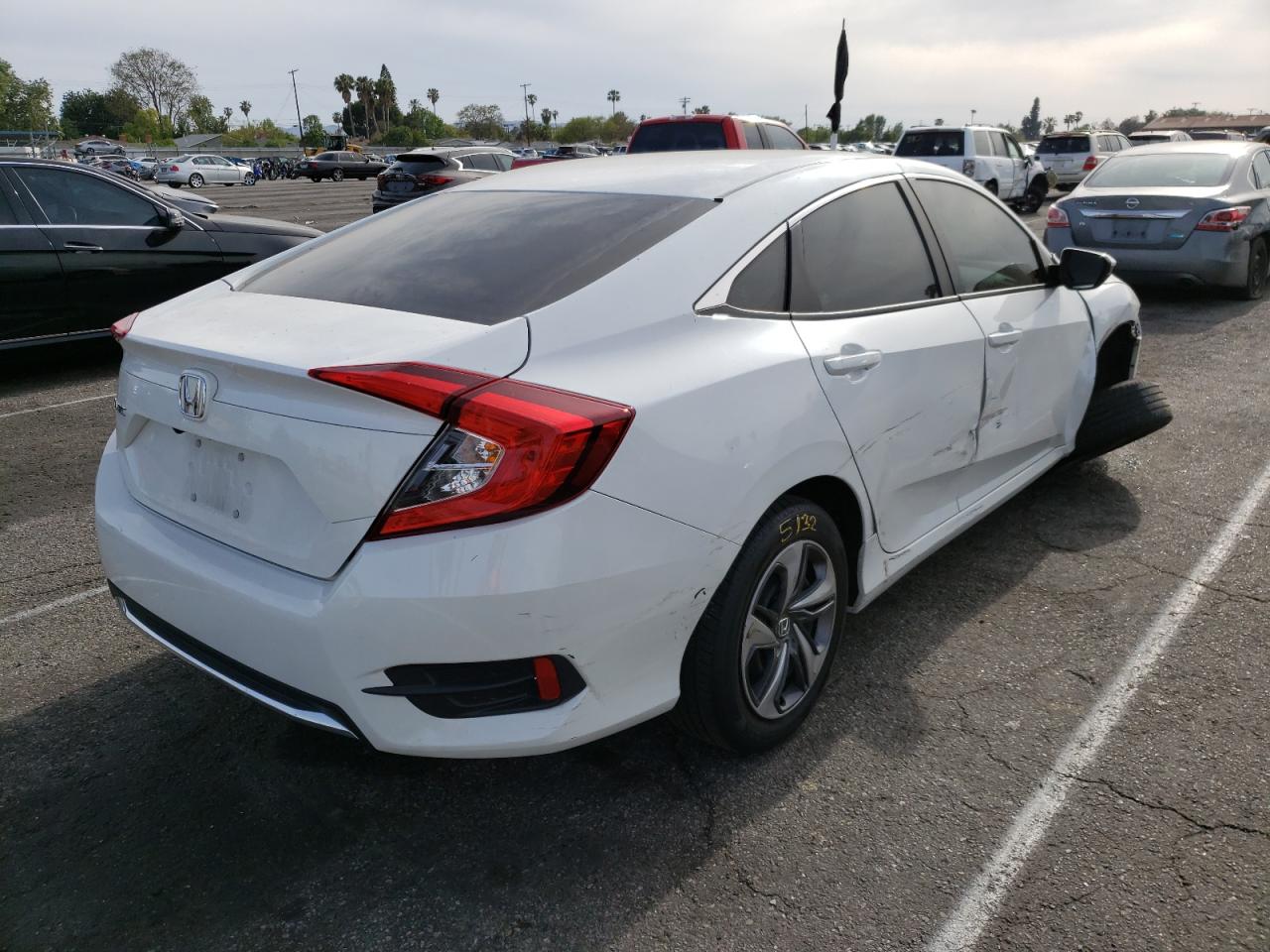 Photo 4 from auction – 2019 HONDA CIVIC LX with VIN 2HGFC2F61KH581484
