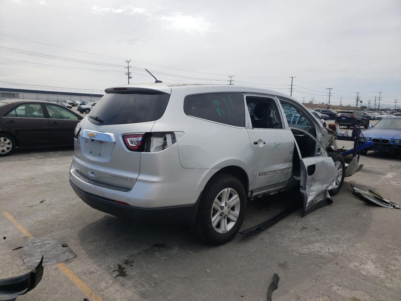 Photo 4 from auction – 2013 CHEVROLET TRAVERSE L with VIN 1GNKRJKD0DJ202753