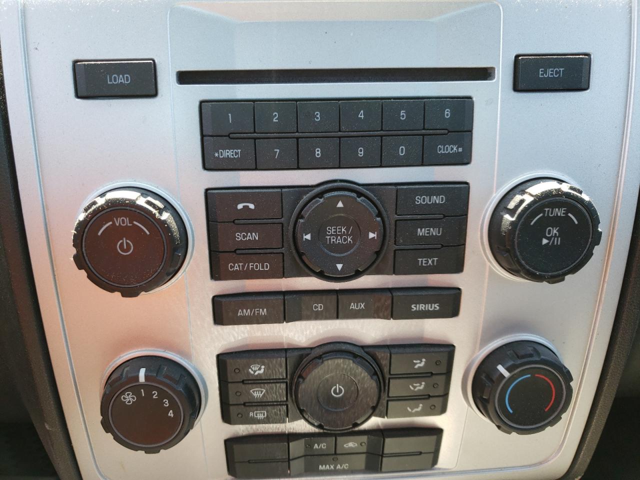 Photo 9 from auction – 2009 MERCURY MARINER with VIN 4M2CU91G99KJ05780