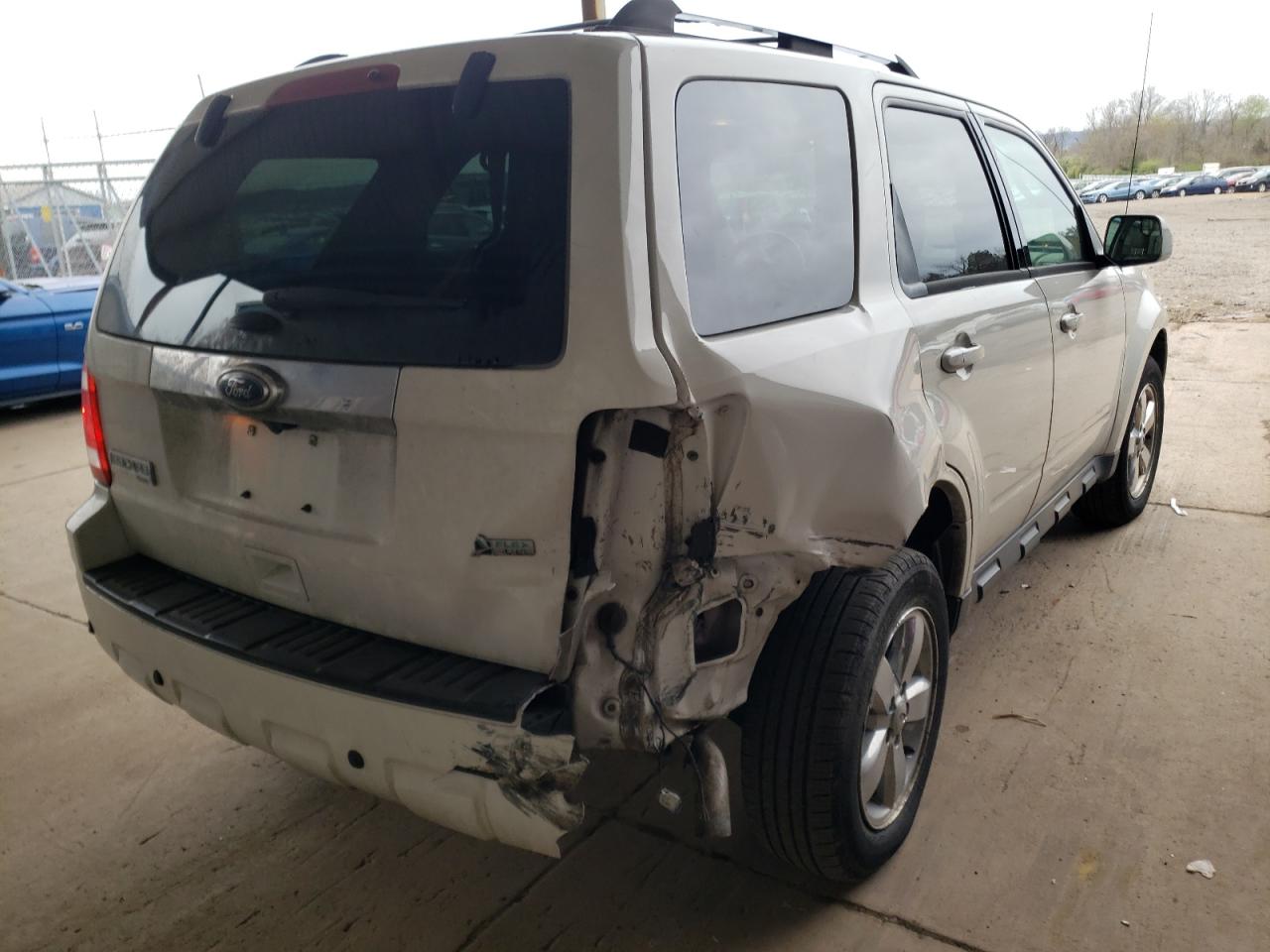 Photo 9 from auction – 2011 FORD ESCAPE LIM with VIN 1FMCU9EG0BKC59375