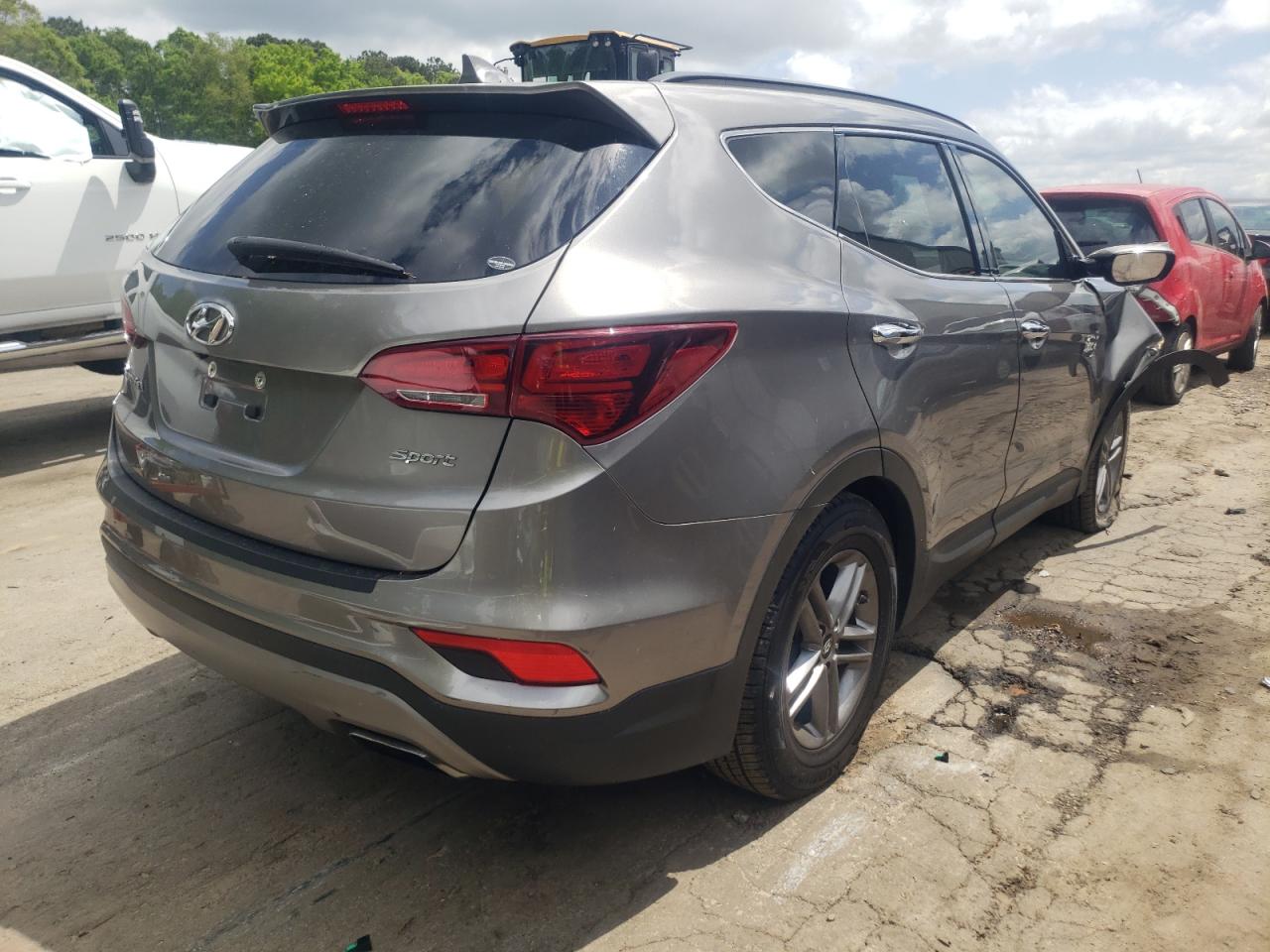 Photo 4 from auction – 2017 HYUNDAI SANTA FE S with VIN 5NMZU3LB9HH025498