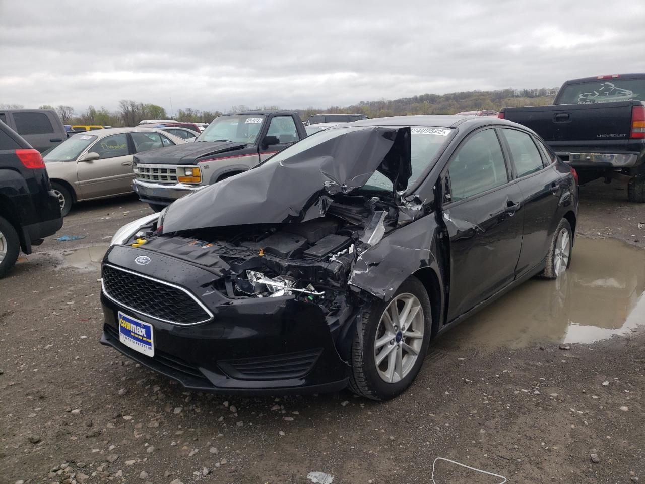 Photo 2 from auction – 2018 FORD FOCUS SE with VIN 1FADP3F23JL212291
