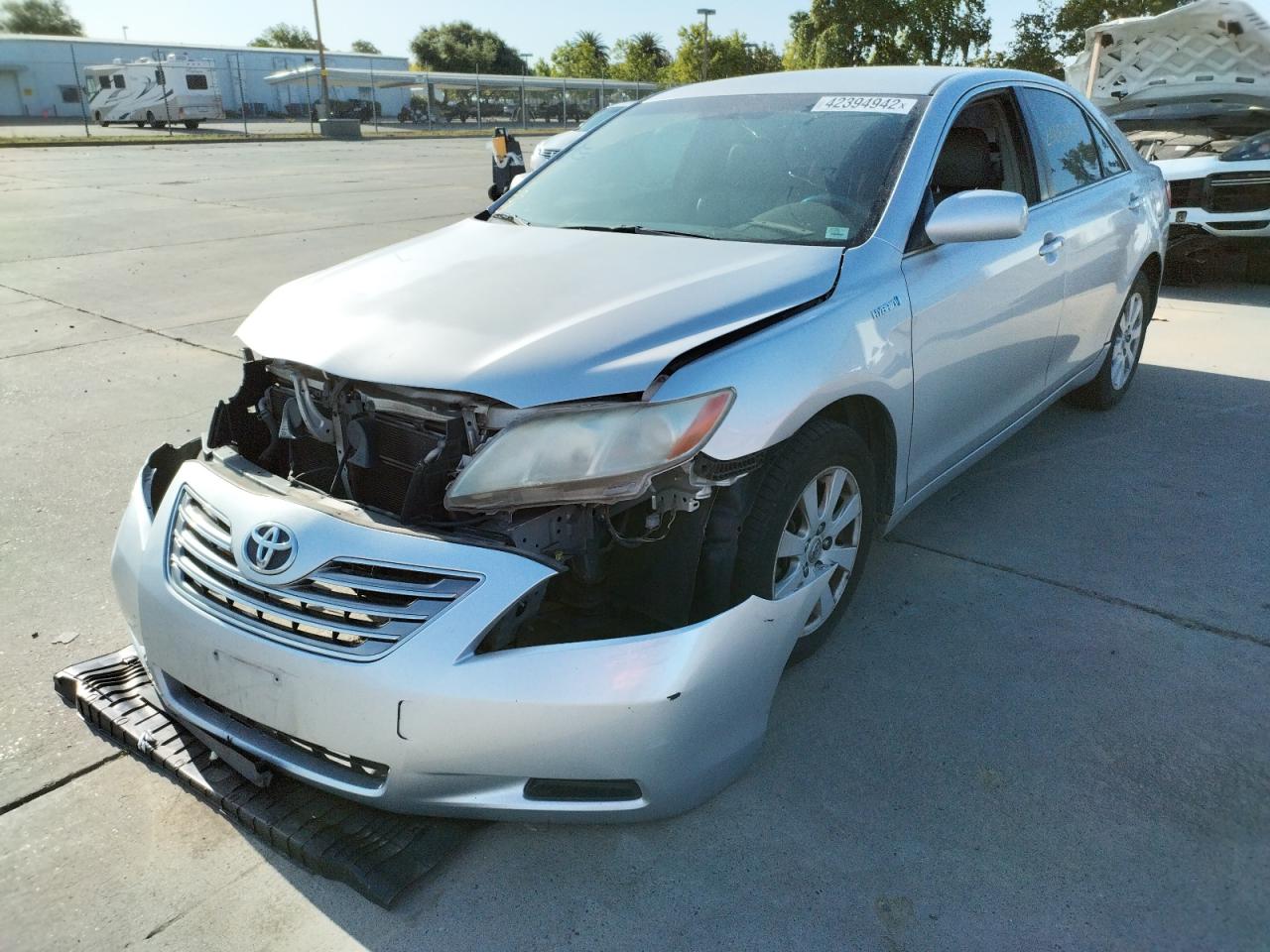 Photo 2 from auction – 2009 TOYOTA CAMRY HYBR with VIN 4T1BB46K59U095966