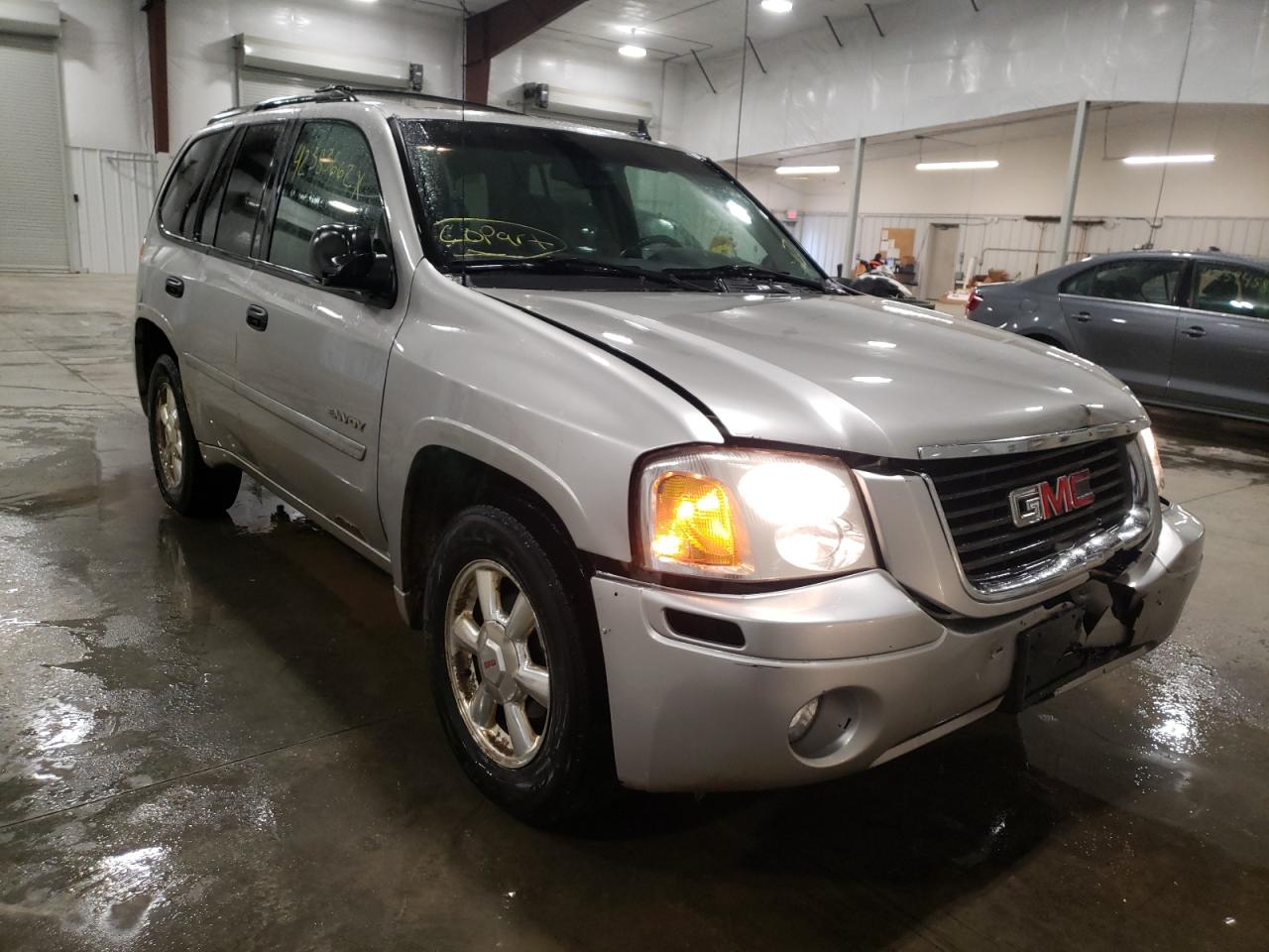 GMC ENVOY 2006 with VIN 1GKDT13S262340036 - Photo from auction