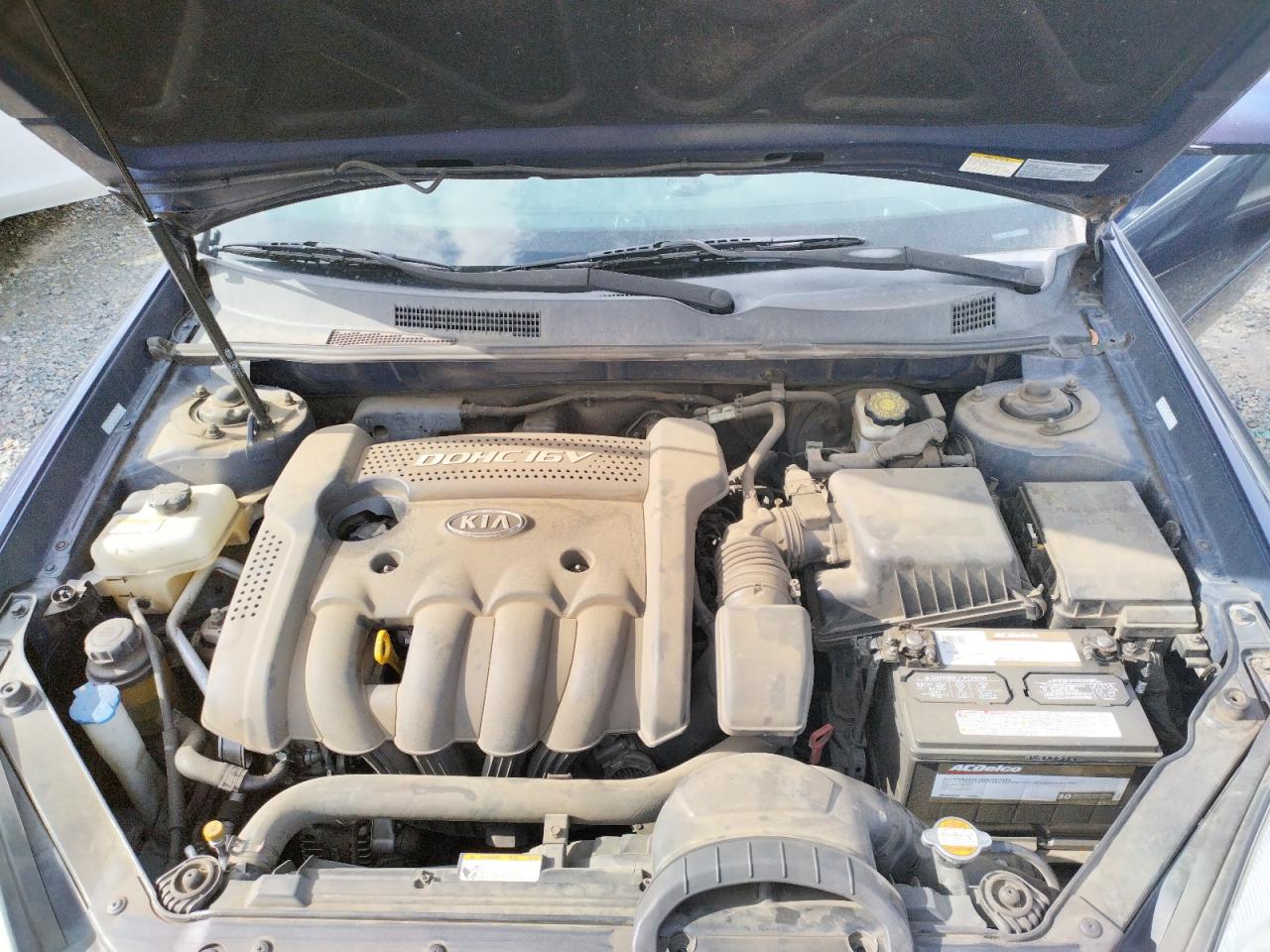 Photo 7 from auction – 2007 KIA OPTIMA LX with VIN KNAGE123275089075