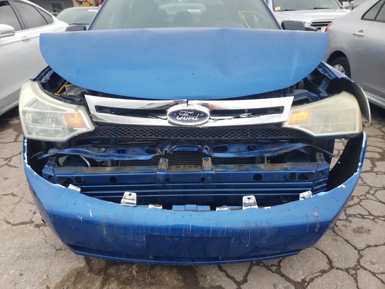 Photo 9 from auction – 2011 FORD FOCUS SE with VIN 1FAHP3FN9BW142338