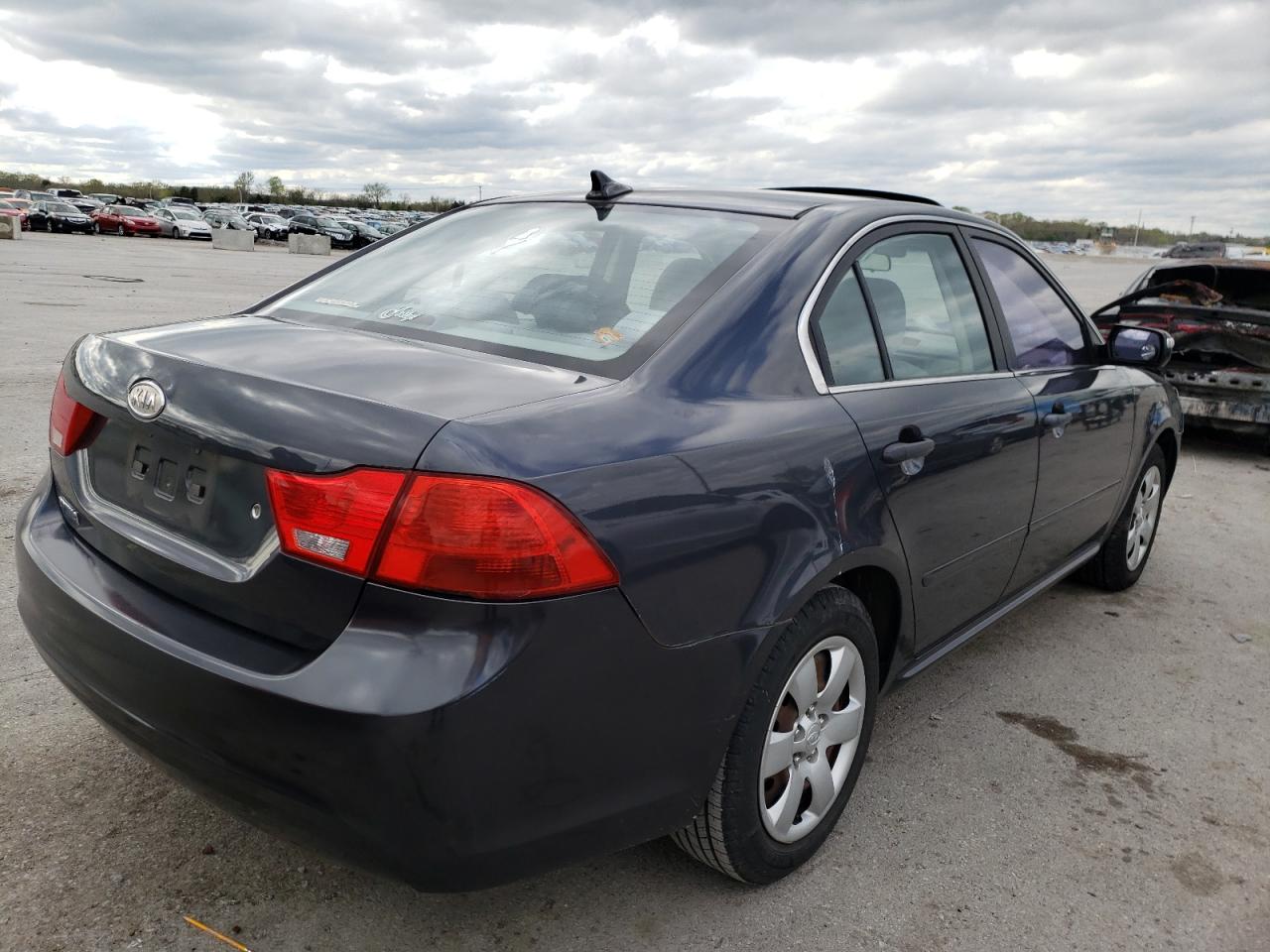 Photo 4 from auction – 2010 KIA OPTIMA LX with VIN KNAGG4A8XA5394257