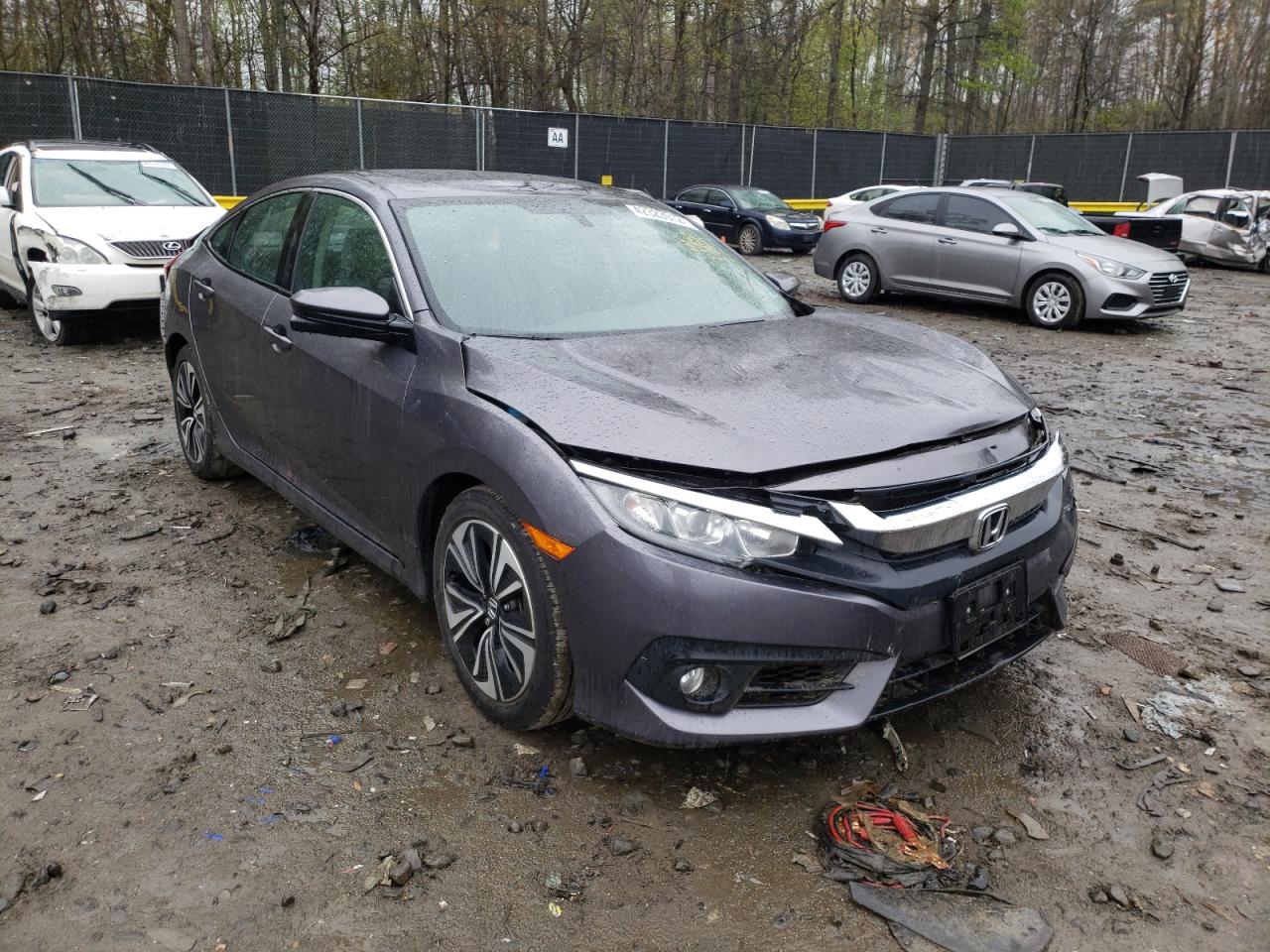 HONDA CIVIC EX 2017 with VIN 19XFC1F35HE214462 - Photo from auction