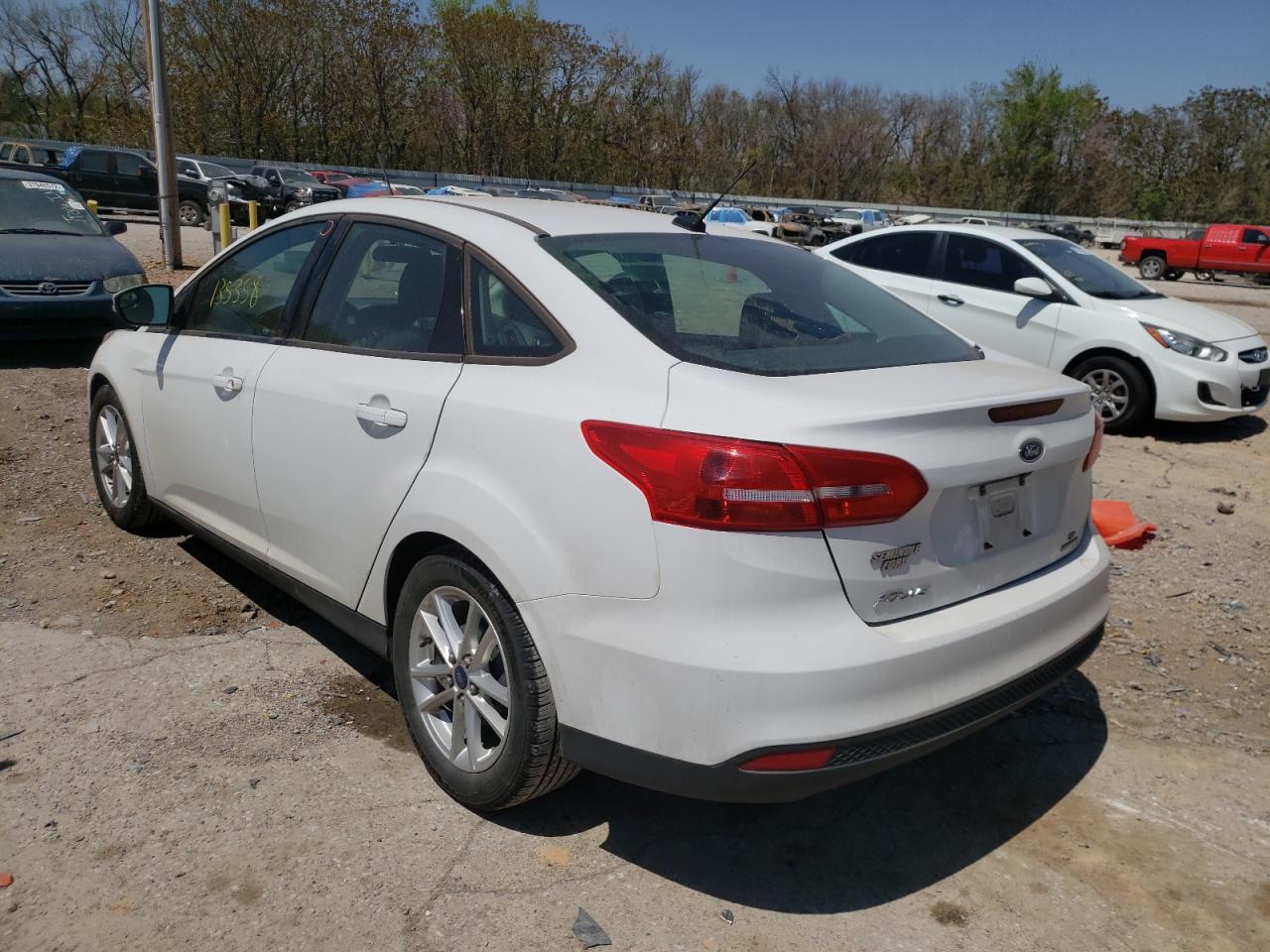 Photo 3 from auction – 2016 FORD FOCUS SE with VIN 1FADP3F29GL204513