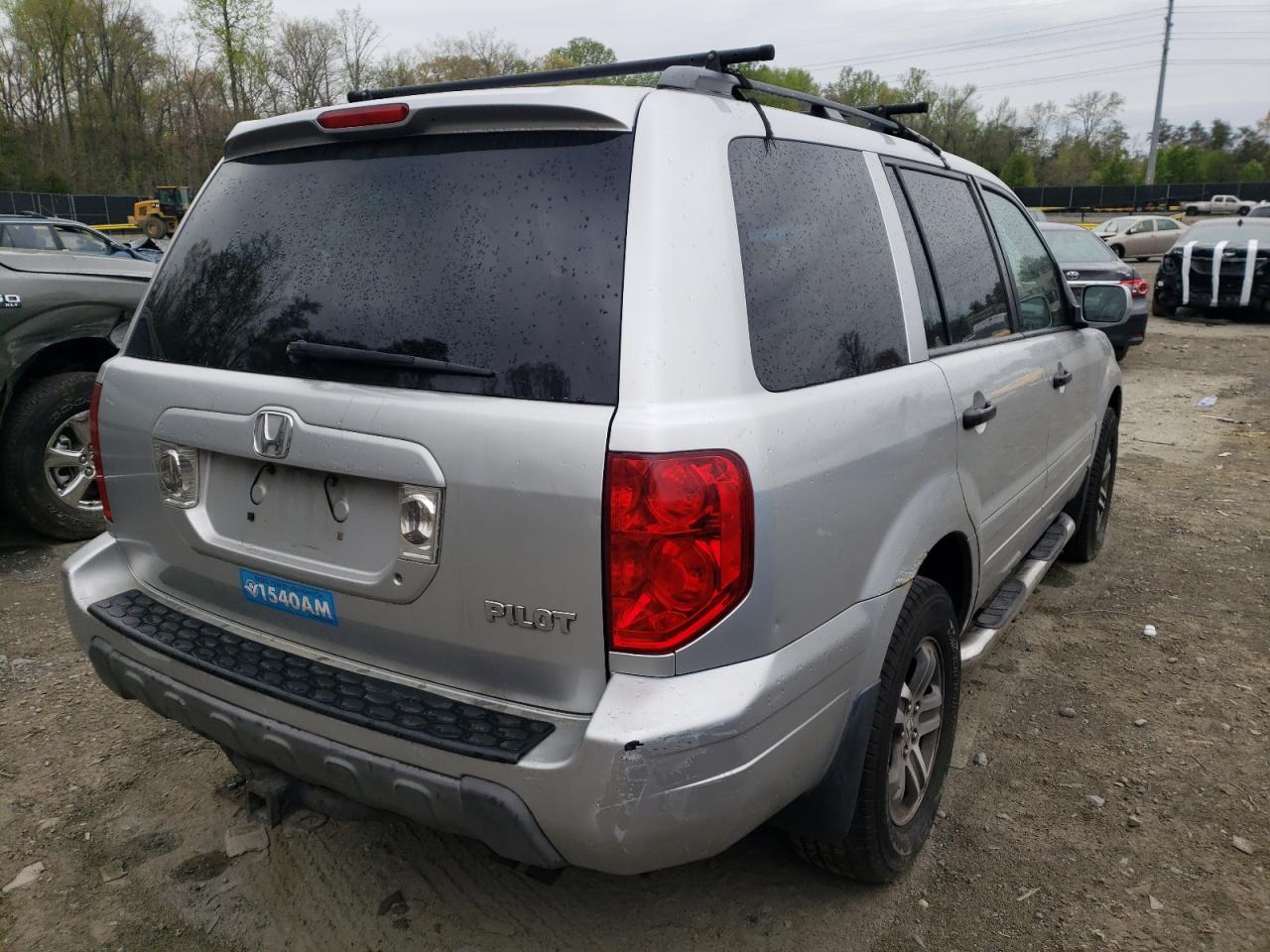 Photo 4 from auction – 2005 HONDA PILOT with VIN 2HKYF18585H508945