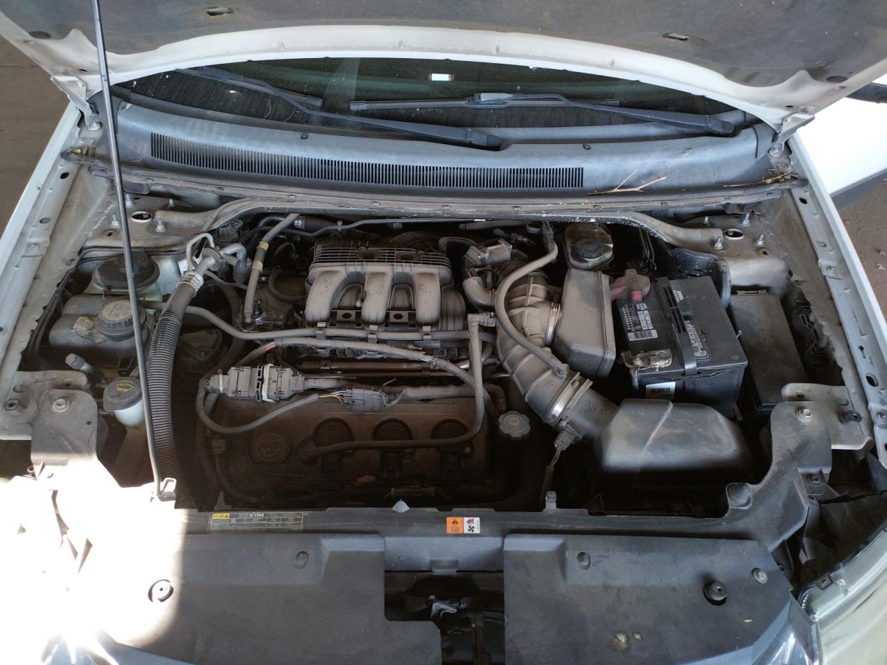 Photo 7 from auction – 2008 FORD TAURUS X S with VIN 1FMDK02W48GA10347