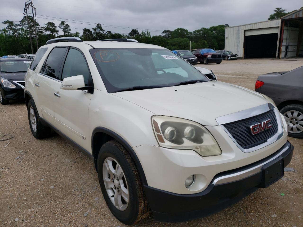 GMC ACADIA SLT 2009 with VIN 1GKER23DX9J165488 - Photo from auction