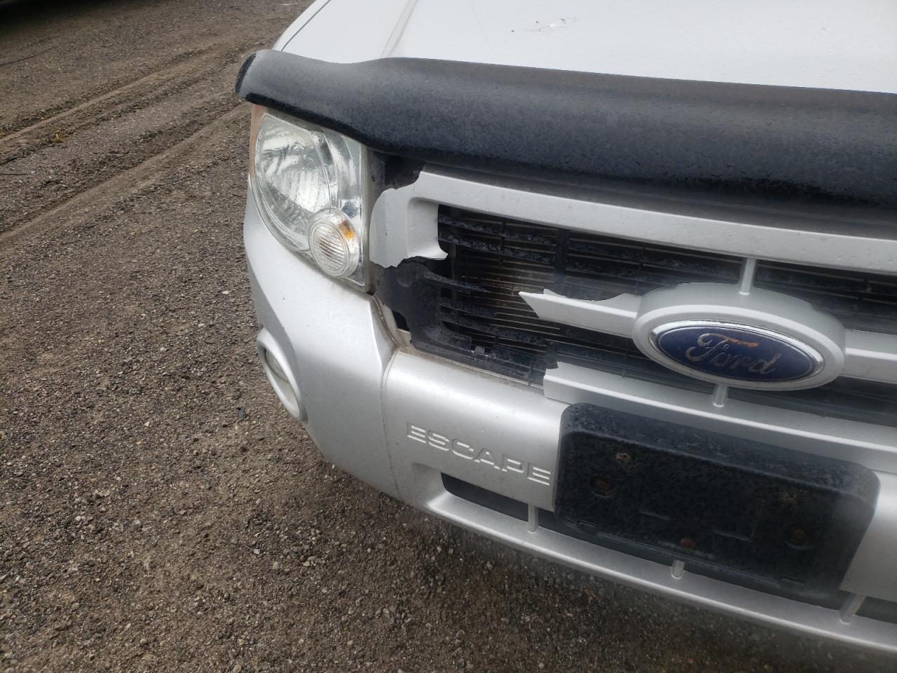 Photo 9 from auction – 2008 FORD ESCAPE LIM with VIN 1FMCU94118KA73849