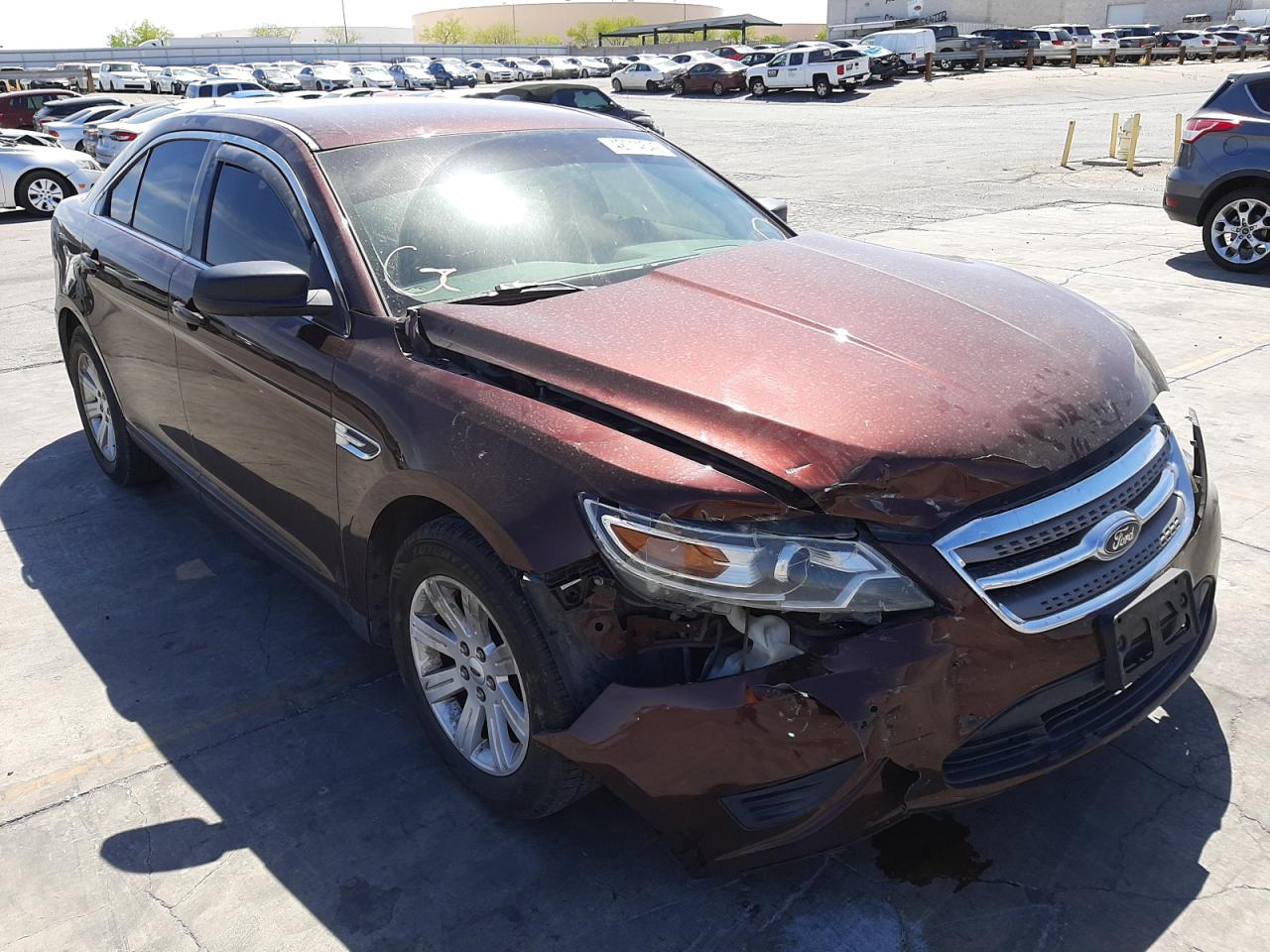 FORD TAURUS 2012 with VIN 1FAHP2DW5CG108365 - Photo from auction