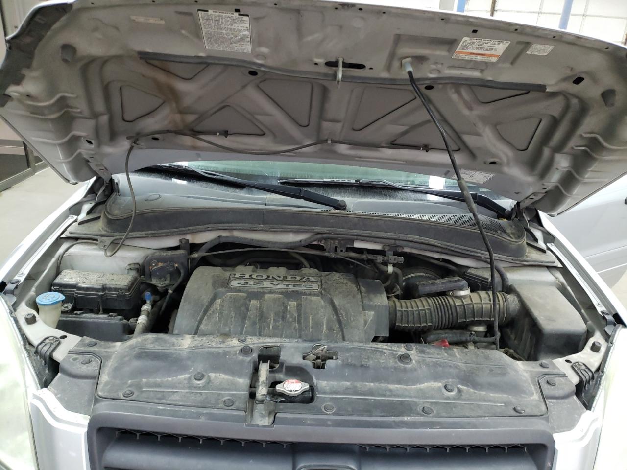 Photo 7 from auction – 2005 HONDA PILOT EXL with VIN 2HKYF18555H523936