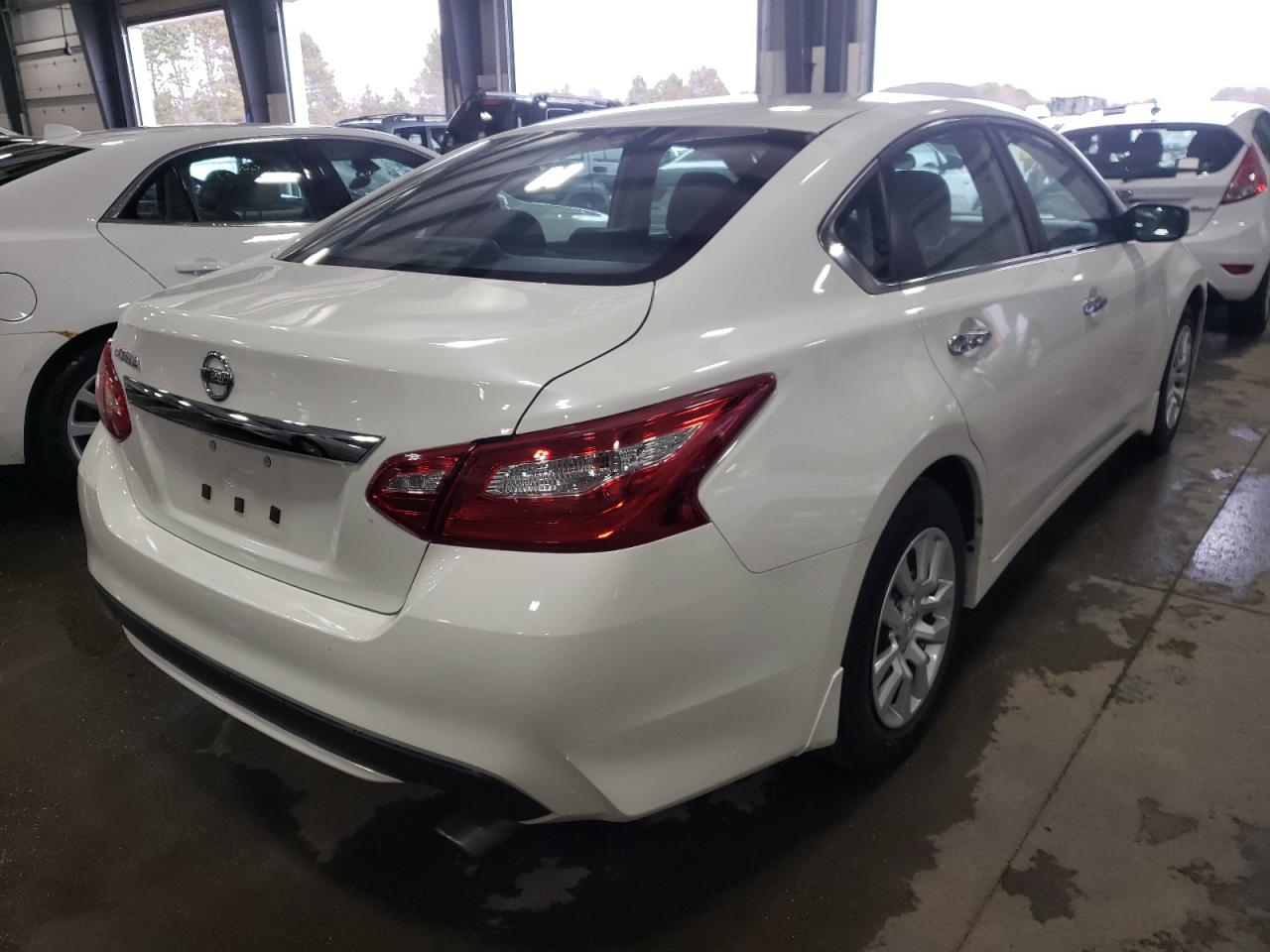 Photo 4 from auction – 2016 NISSAN ALTIMA 2.5 with VIN 1N4AL3AP6GN386872