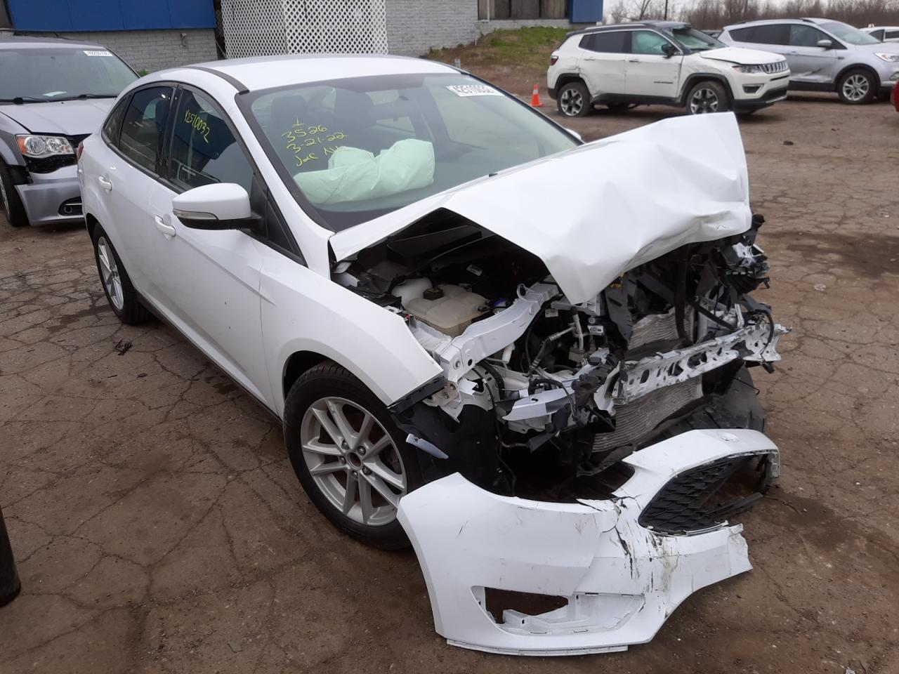 FORD FOCUS SE 2017 with VIN 1FADP3F24HL283526 - Photo from auction