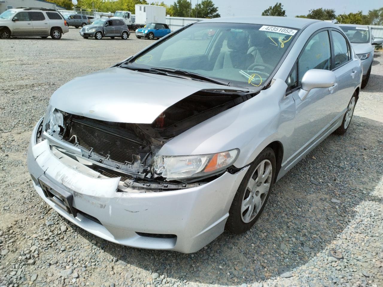 Photo 9 from auction – 2011 HONDA CIVIC LX with VIN 2HGFA1F57BH531695